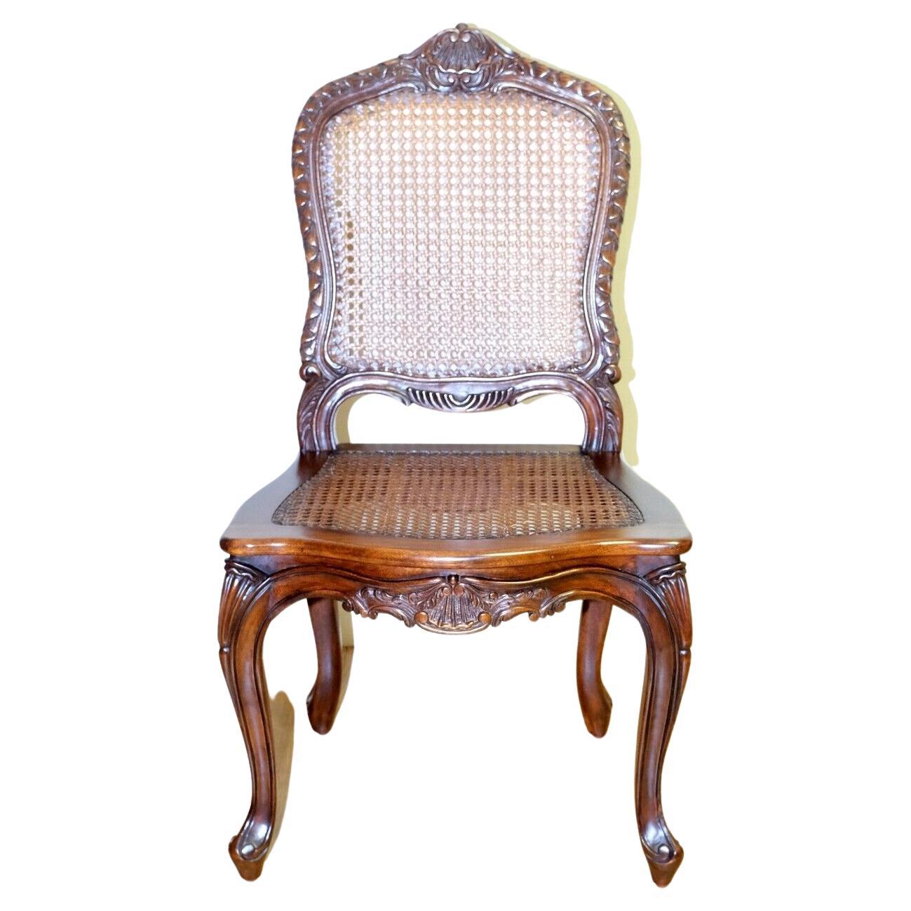 We are delighted to offer for sale this gorgeous And So To Bed occasional Beechwood hand-carved cane seat chair. 

This elegant floral hand carved chair from 'And So To Bed' English furniture makers shows its high quality designs, as it was made