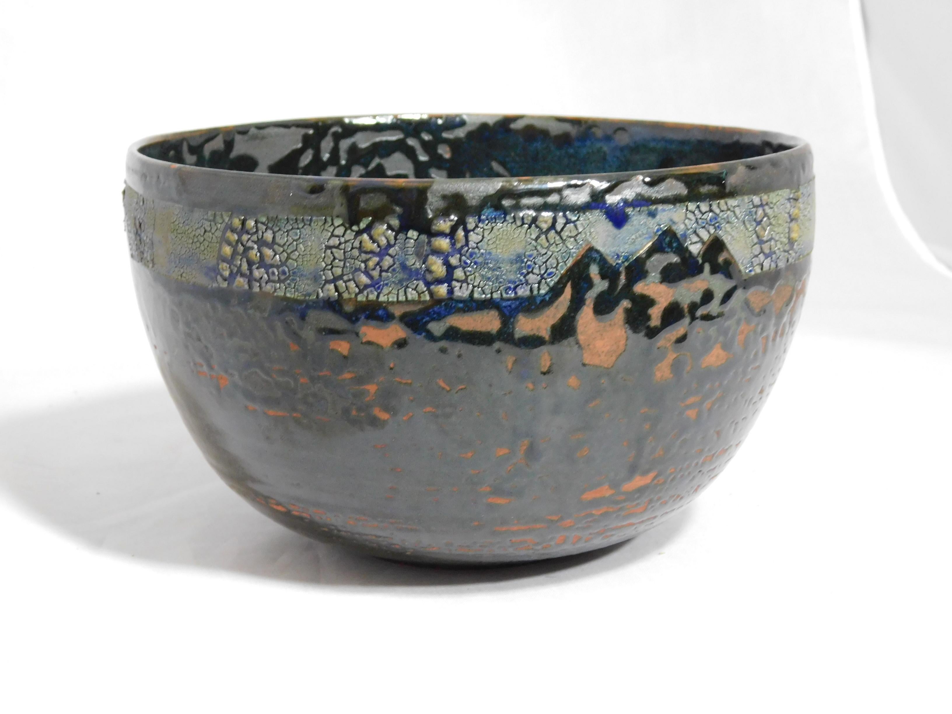 Wheel thrown Andenes earthenware bowl by ceramicist Andrew Wilder. This is a one of a kind object made in the ancient way- by hand in a small artisanal pottery. In this series Wilder explores the application of lichen under glazes to achieve jewel,