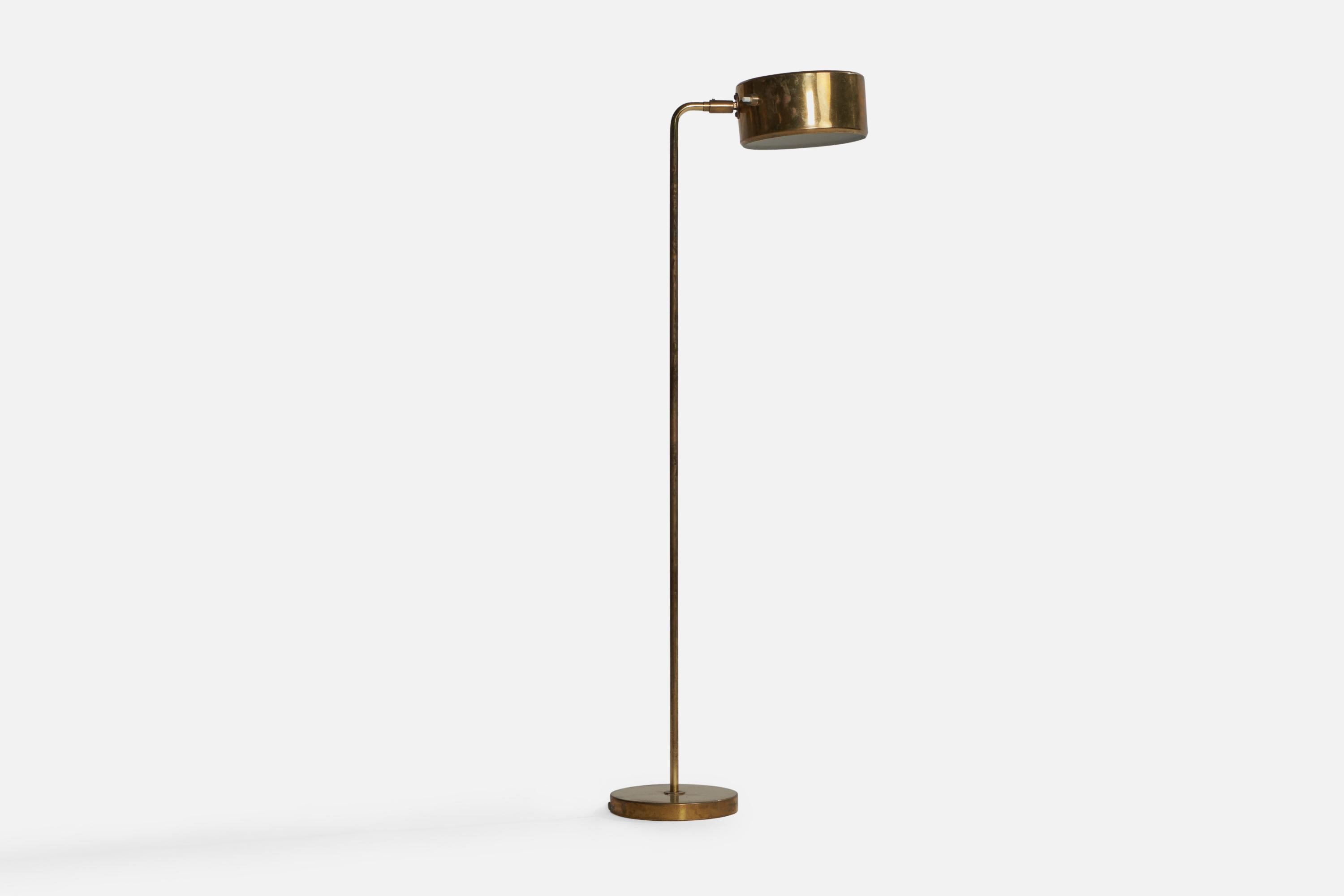 A brass floor lamp designed by Anders Pehrson and produced by Ateljé Lyktan, Sweden, c. 1970s.

Overall Dimensions (inches): 44.5” H x 7.5” W x 11” D.
Dimensions vary based on position of light.
Bulb Specifications: E-14 Bulbs
Number of Sockets: