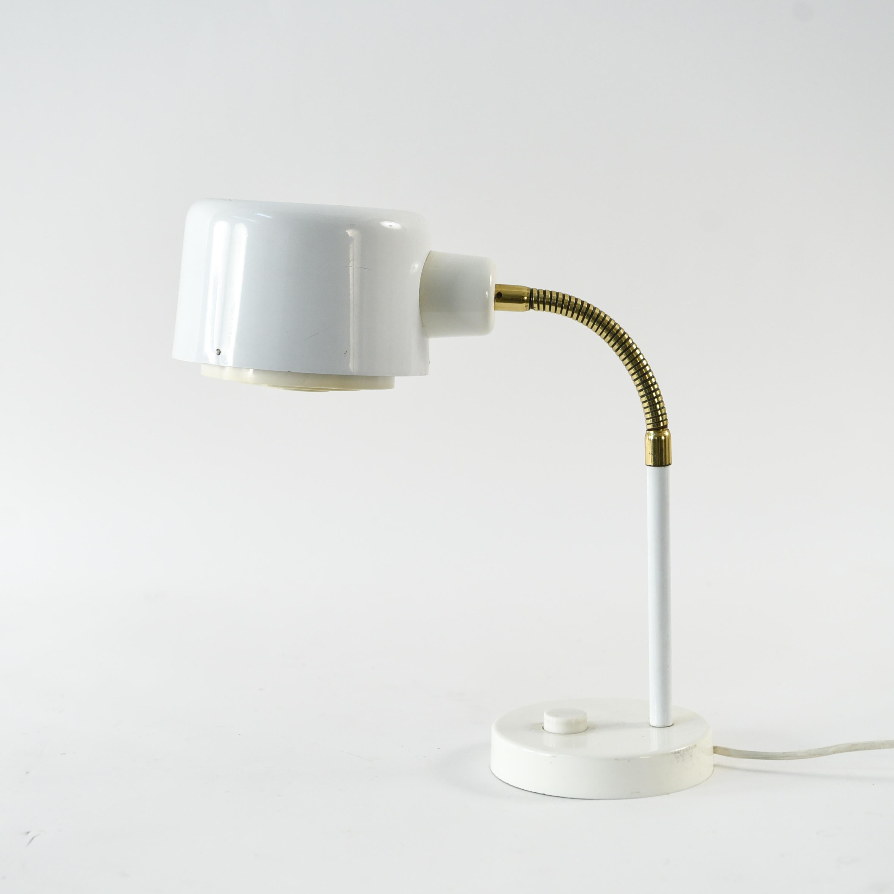 This is a desk or table lamp is in the manner of one designed by Anders Pehrson for Ateljé Lyktan in model 