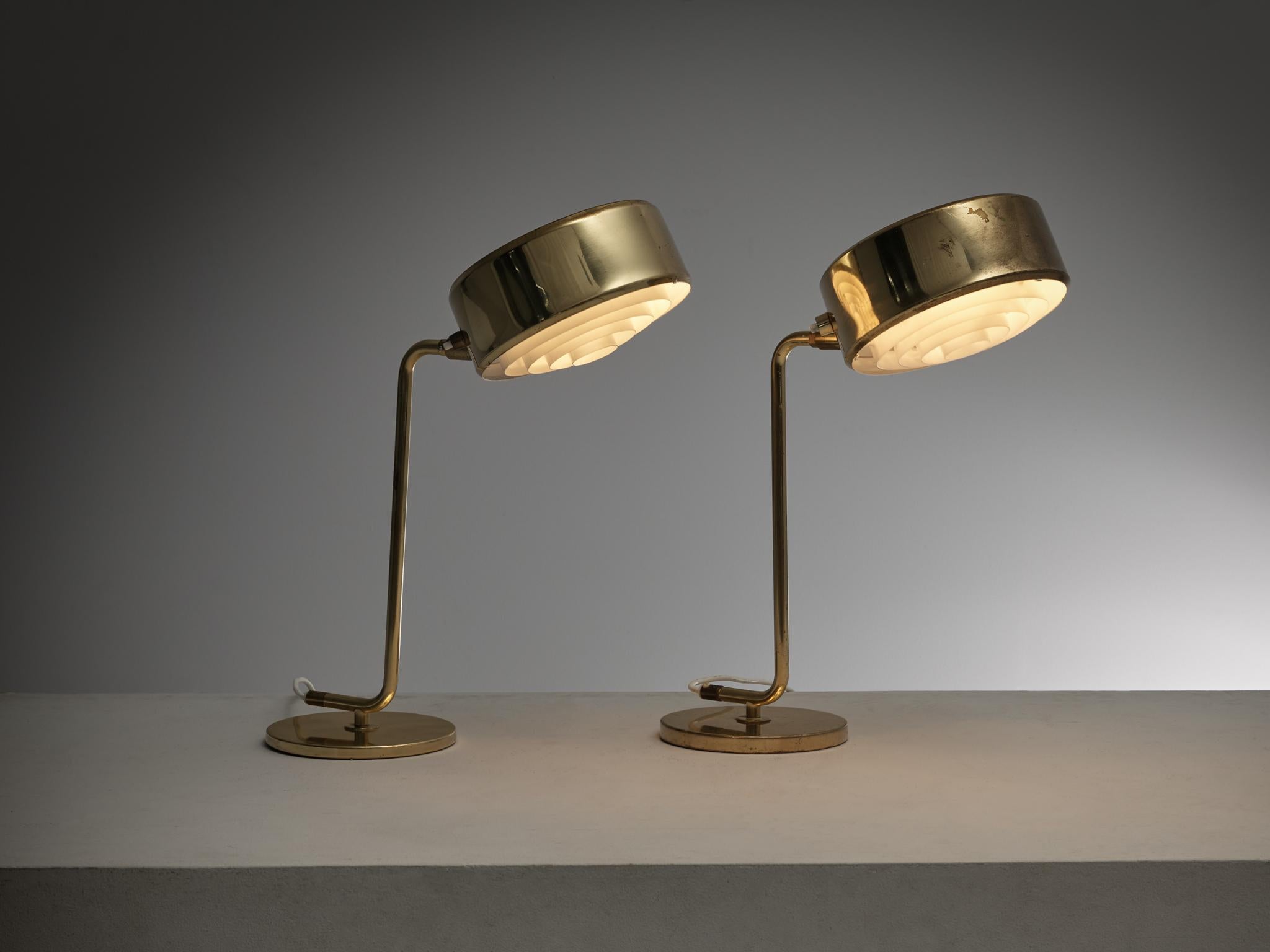 Anders Pehrson for Atelje´Lyktan, table or desk lamp, 'Olympic', brass, Sweden, 1972

Pair of 'Olympic' table lights by Anders Pehrson for Atelje´Lyktan. This outstanding desk or table lamp was designed for the Olympic village of the 1972 Olympic