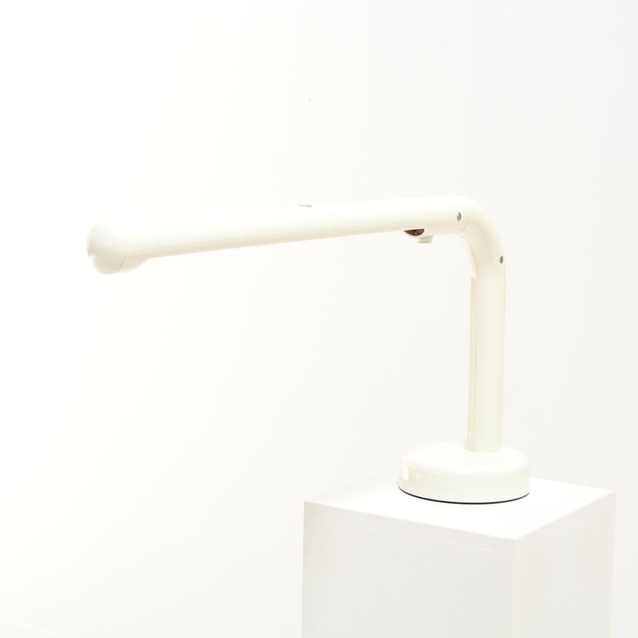 Very functional desk light, designed in 1973, by Swedish designer Anders Pehrson for Ateljé Lyktan.

I think it’s a very clever design. It is not only a beautiful lamp with progressive design techniques for that time, but also the height of the lamp