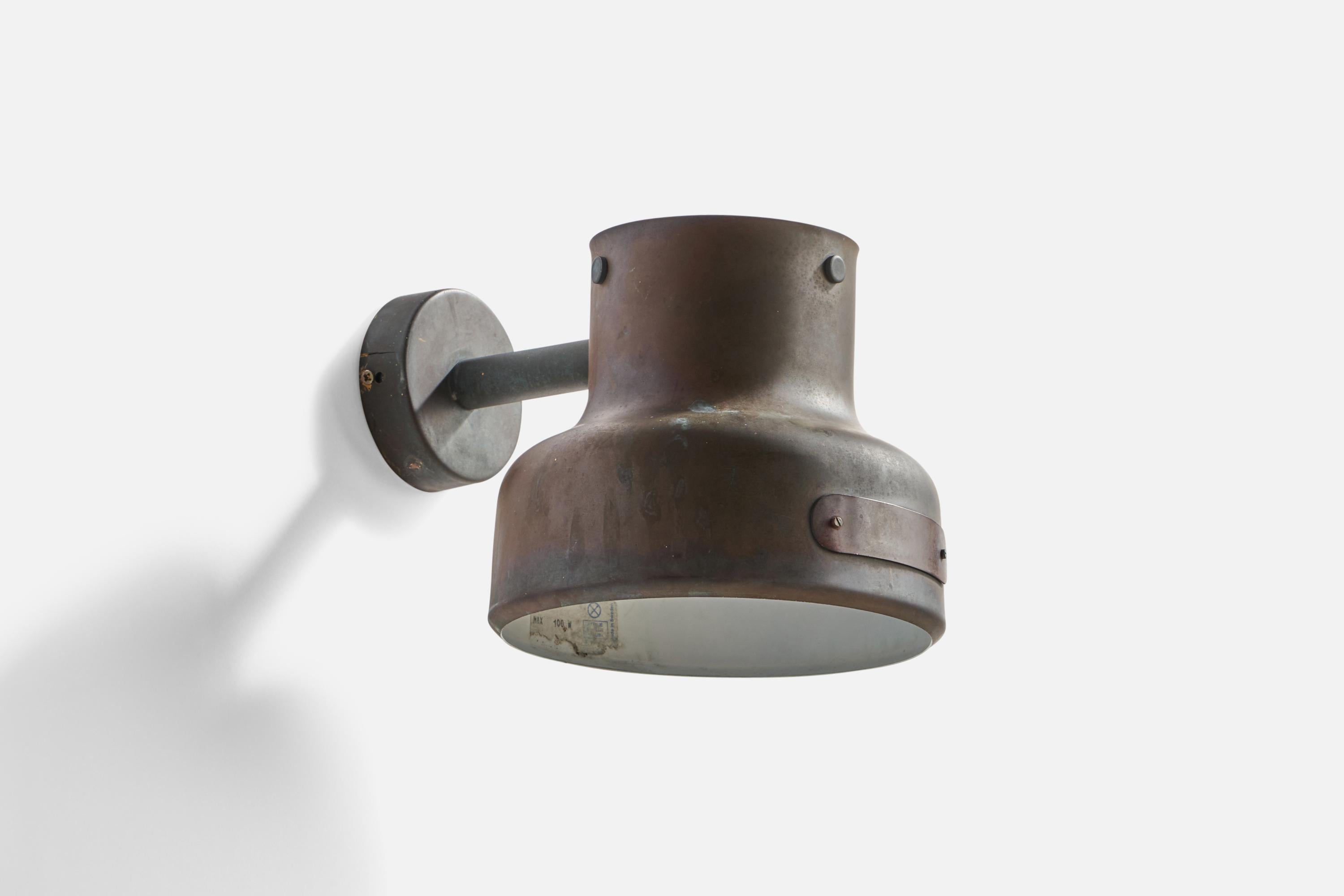 A copper wall light designed by Anders Pehrson and produced by Atelje Lyktan, Sweden, 1960s.

Overall Dimensions (inches): 6.78” H x 7.58” W x 10.25” D
Back Plate Dimensions (inches): 3.5” Diameter x 1” Depth
Bulb Specifications: E-26 Bulb
Number of