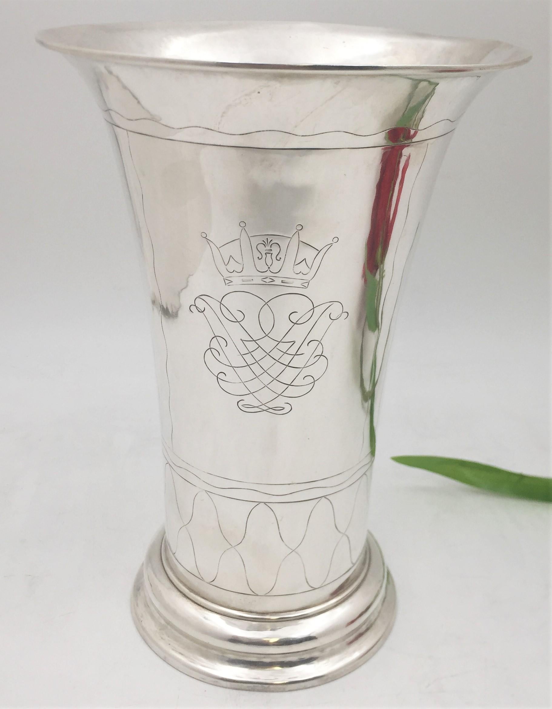K. Anderson, Swedish silver vase from 1938 in Mid-Century Modern style with a beautiful, geometric design, enhanced by curvilinear engravings. It measures 10'' in height by 7'' in diameter at the top, weighs 18 troy ounces, and bears hallmarks as