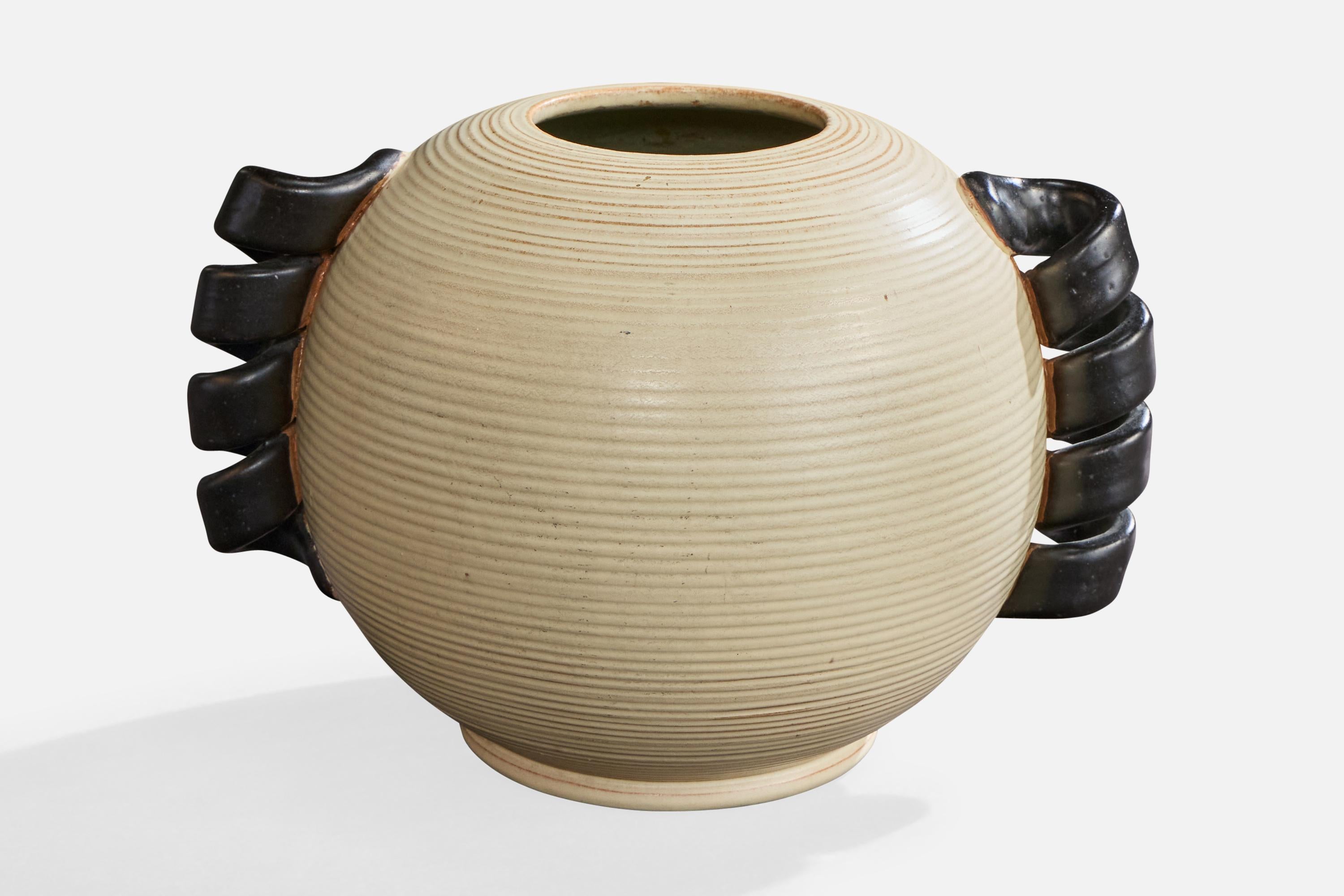 A beige and black-lacquered ceramic vase produced by Andersson & Johansson, Sweden, c. 1940s.

Overall Dimensions (inches): 7.1