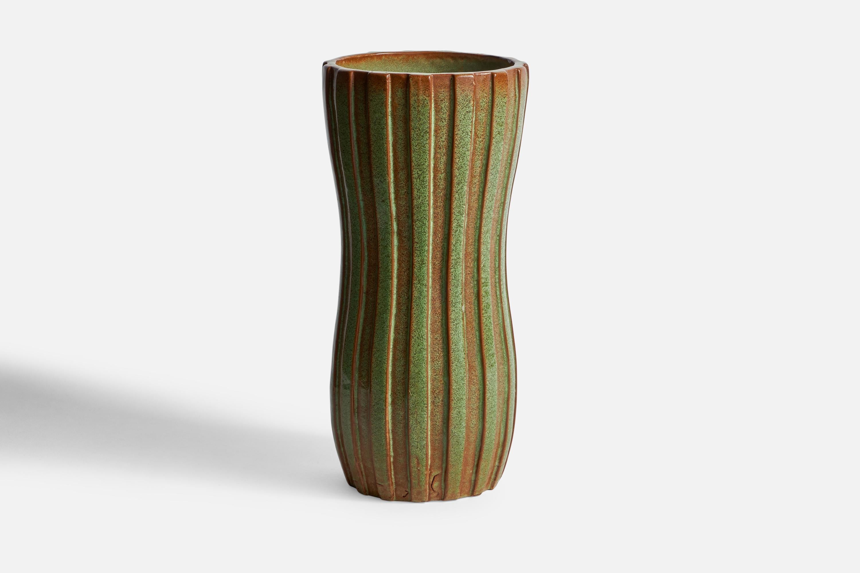 A sizeable green-glazed and fluted vase designed and produced by Andersson & Johansson, Höganäs, Sweden, c. 1940s.

