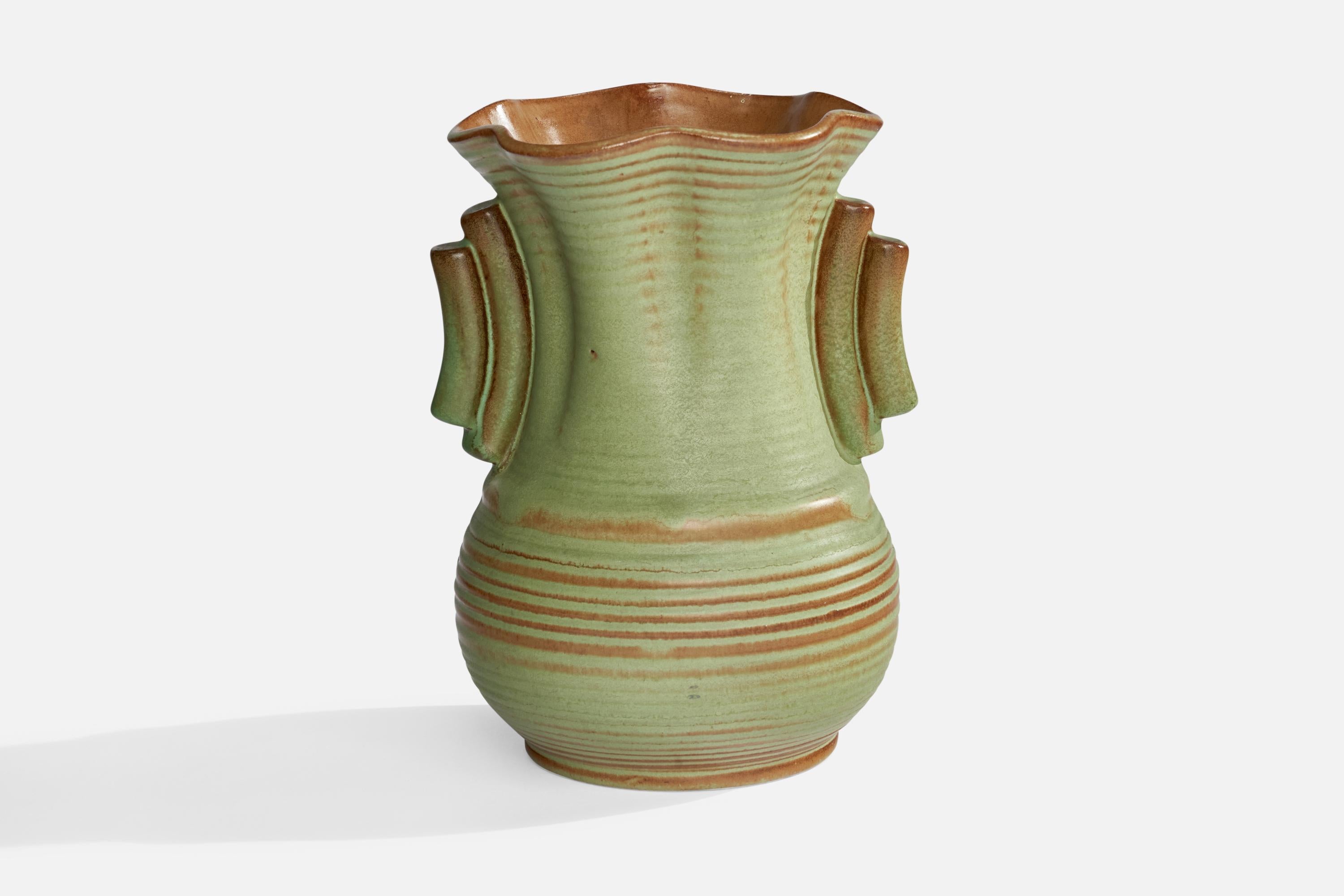 A green-glazed and incised vase designed and produced by Andersson & Johansson, Höganäs, Sweden, c. 1940s.