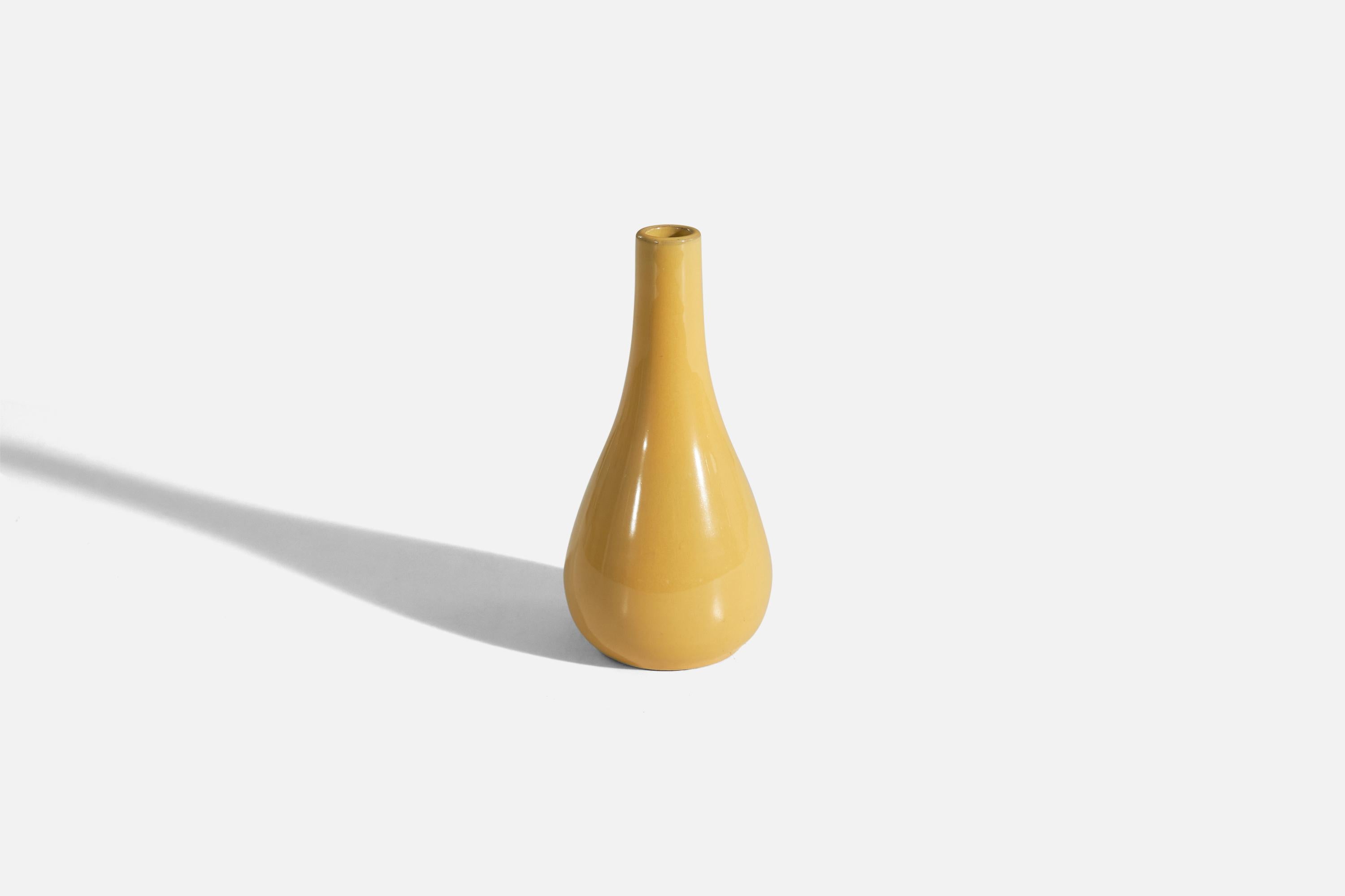 A yellow, glazed stoneware vase designed and produced by Andersson & Johansson, Höganäs, Sweden, c. 1940s.