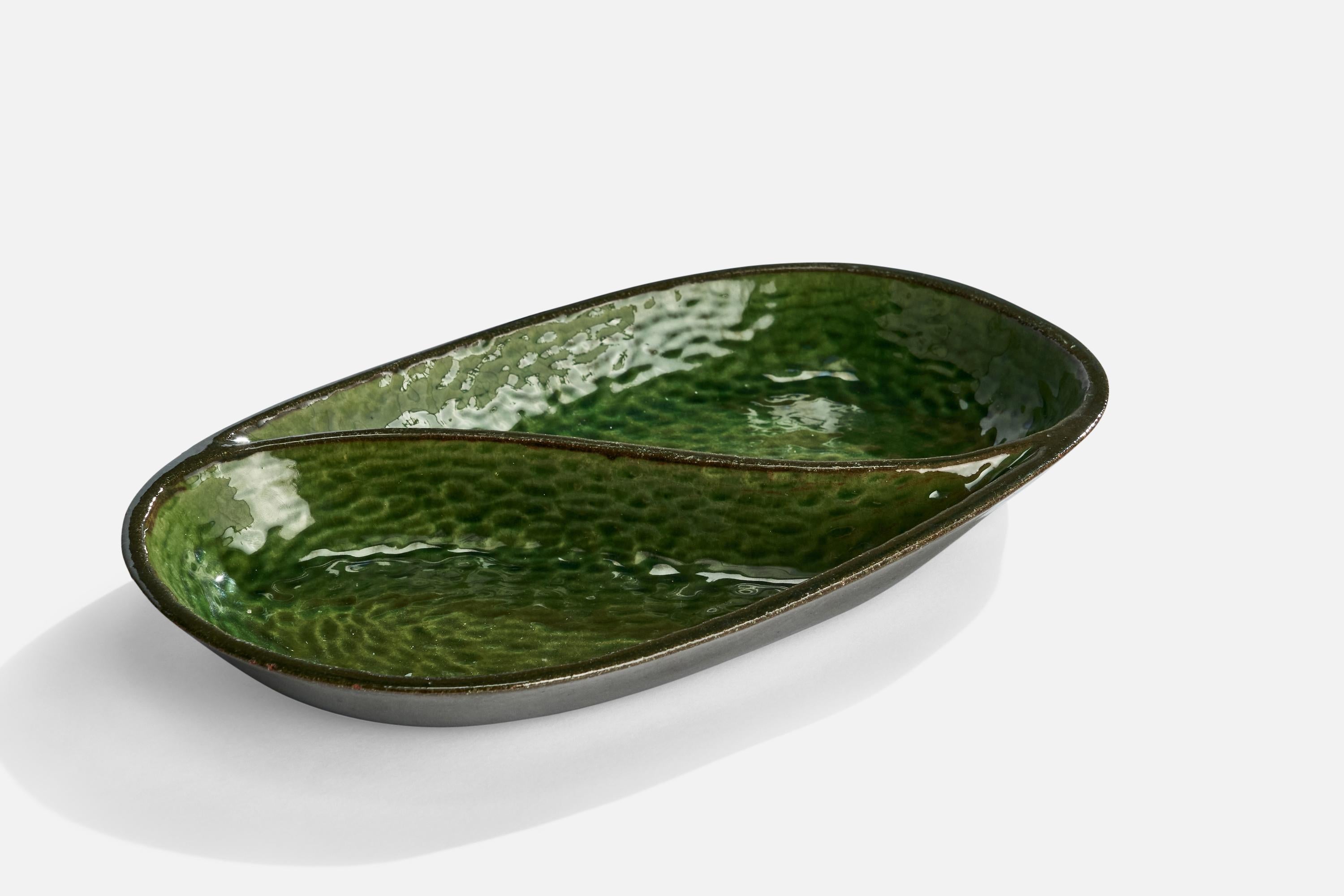 A green-glazed poche-vide designed and produced by Andersson & Johansson, Höganäs, Sweden, c. 1940s.