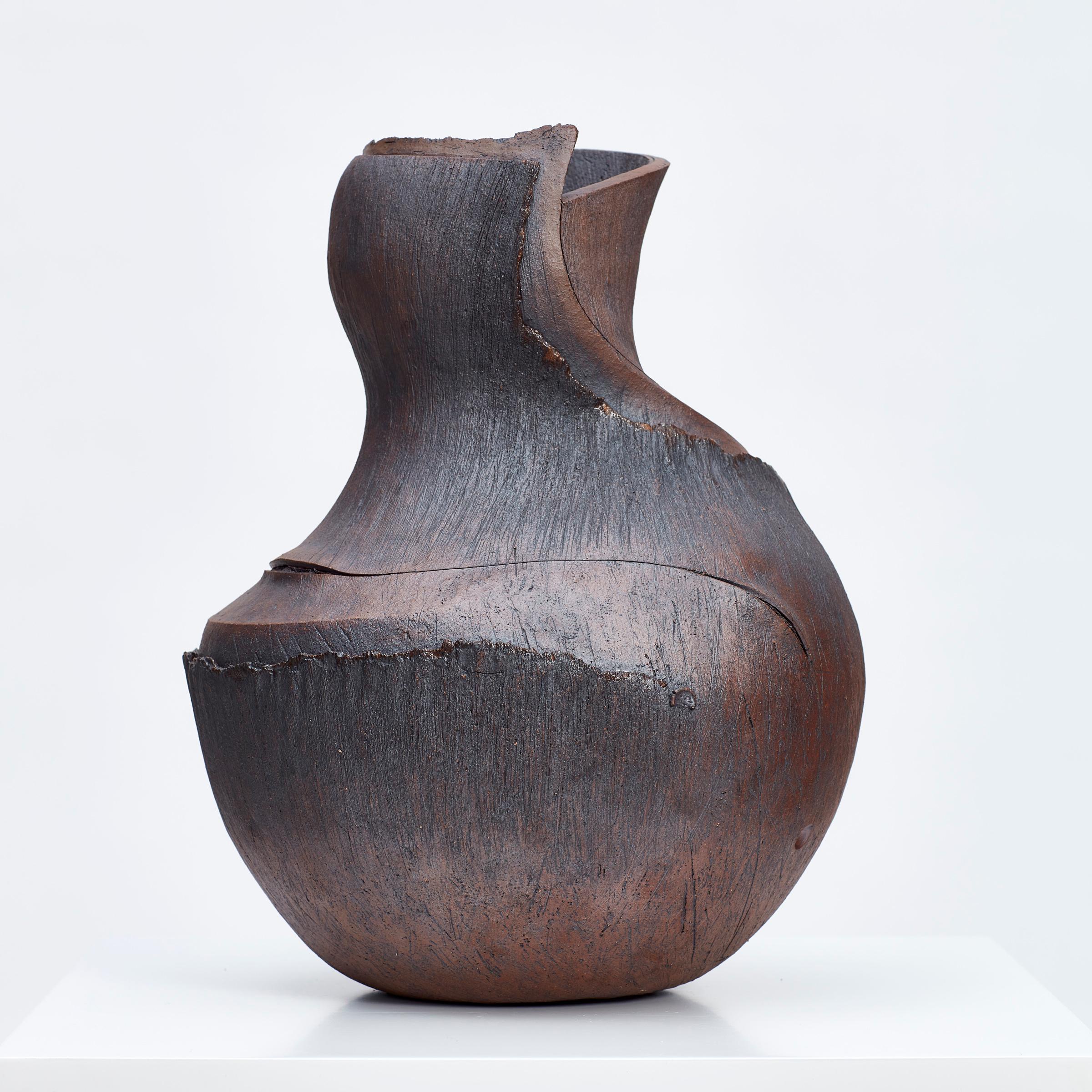 Widely considered one of South Africa’s foremost ceramic artists, Andile Dyalvane is guided by a deep spiritual connection to his Xhosa ancestors through his work. This ceramic sculptural piece is part of a body of work produced by Dyalvane during a
