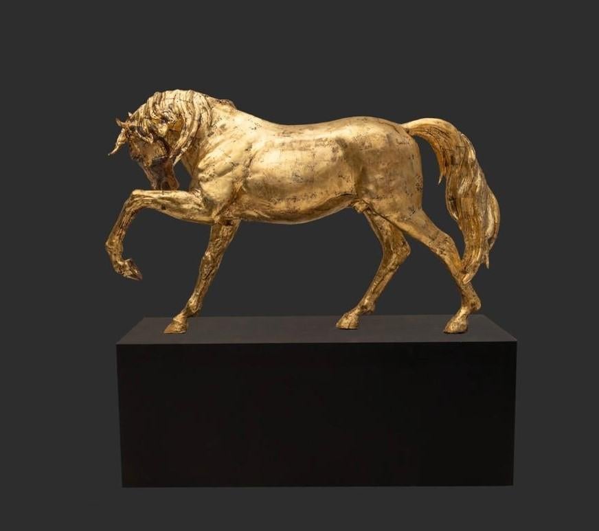 Andje Pietrzyk   

Monumental gilded bronze horse.

Magnificent creation made of finely chiseled bronze and covered with 24-carat gold leaf, depicting a thoroughbred with a dynamic, proud and elegant posture.  

 Height: 170 cm  
Length: 200 cm 