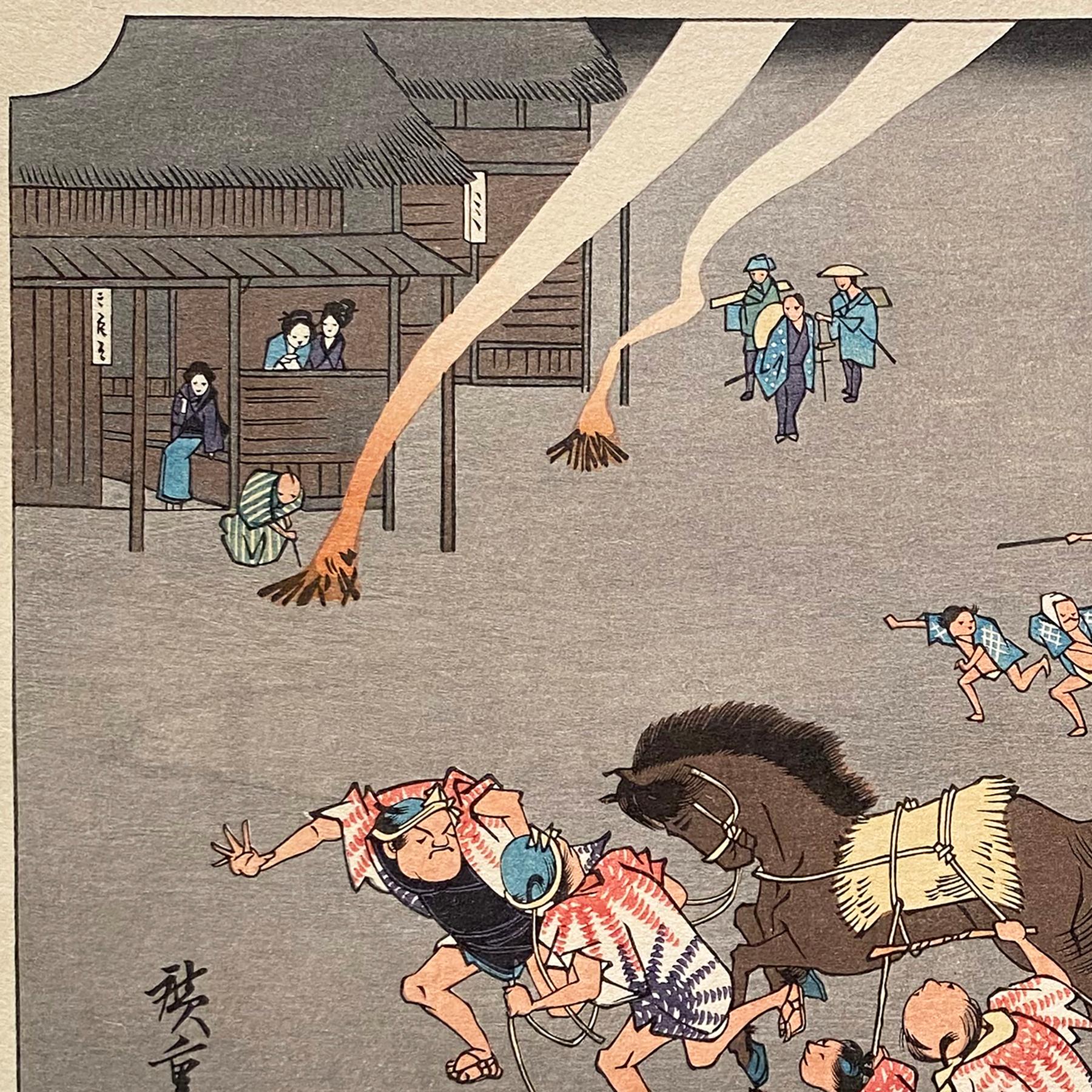 An ink on paper, Nishiki-e and Yoko-e woodblock landscape showing a view of Miya's annual Umaoi-horse chasing festival. Signed in Kanji lower left, 