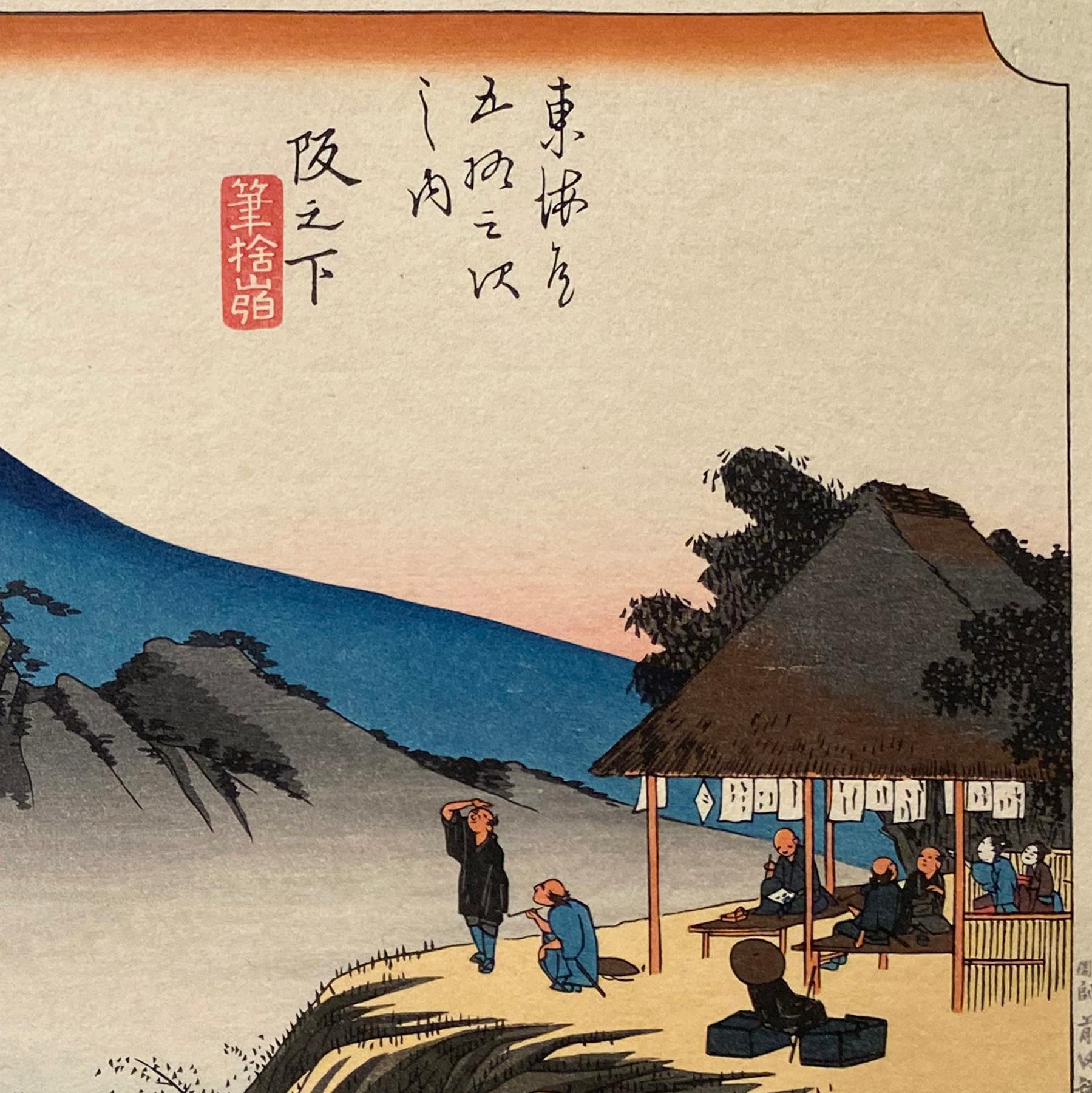An ink on paper, Nishiki-e and Yoko-e woodblock landscape showing a view of travelers admiring Mt. Fudesute in Sakanoshita. Signed in Kanji lower left, 