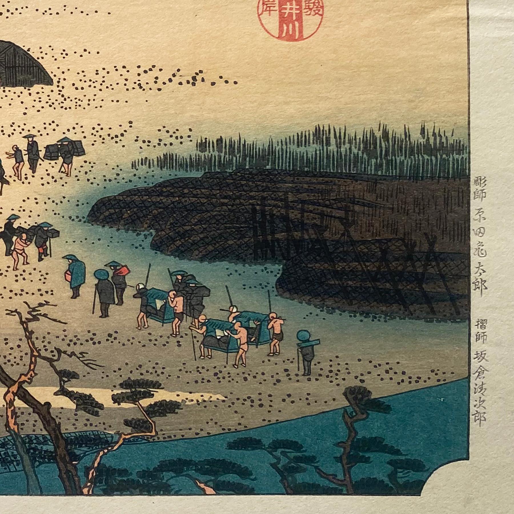 An ink on paper, Nishiki-e and Yoko-e woodblock landscape showing a view of travelers crossing the Suruga bank of the Ōi River, circa 1850. Signed in Kanji lower left, 