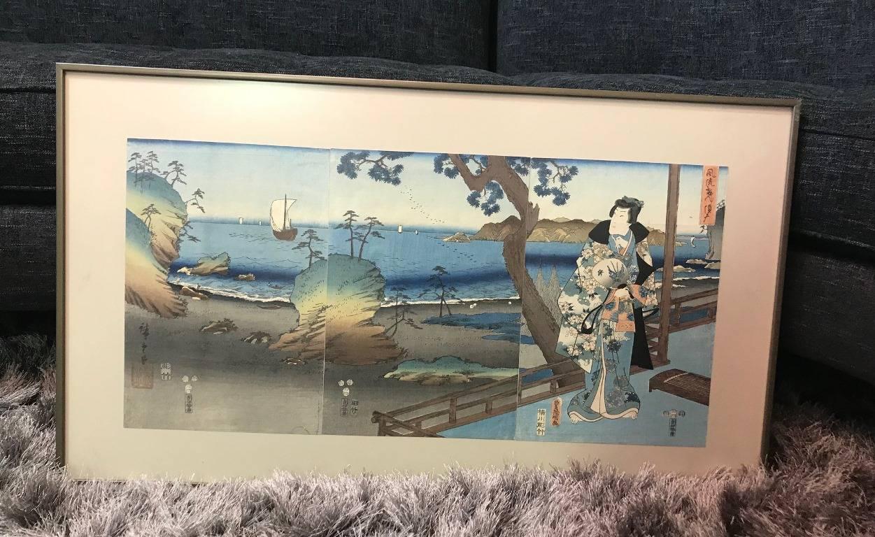 Stunning and rare, this beautiful and panoramic Japanese woodblock triptych print was produced in the 1850s in a now famed collaboration between renowned artists Utagawa (Ando) Hiroshige and Utagawa (Toyokuni III) Kunisada. Hiroshige was the leading