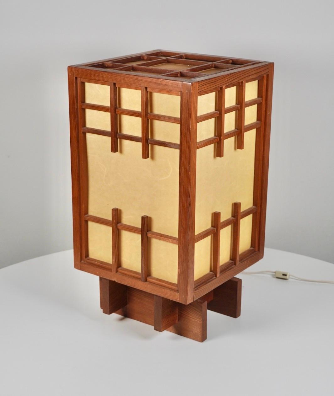 Finely crafted Andon style table lamp of redwood and rice paper. Created sometime during the 1980s by a California studio woodworker in the Bay Area, maker unknown, came from an home that had numerous pieces of George Nakashima and this lamp was