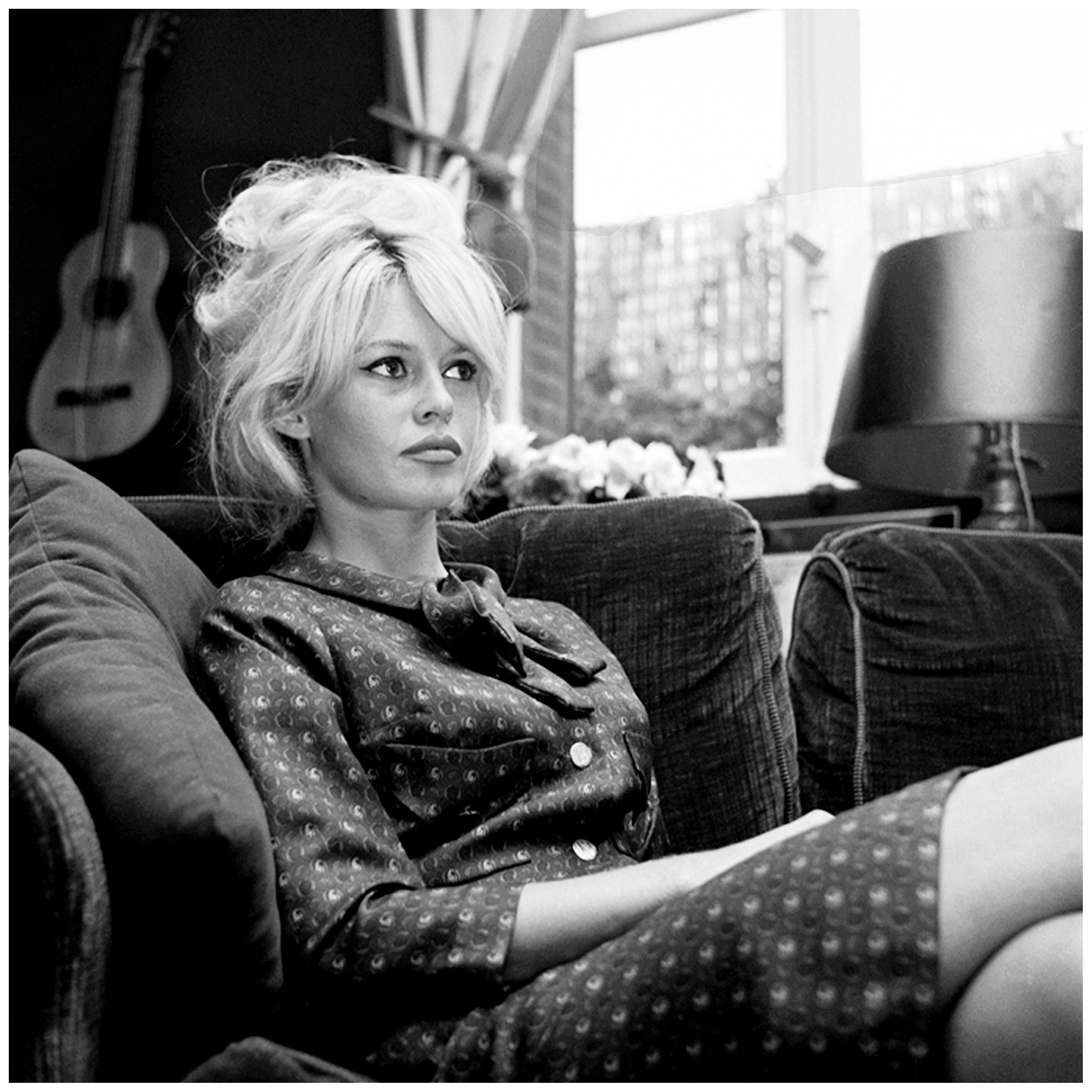 André Sas Portrait Photograph - Brigitte Bardot in her apartment in Paris