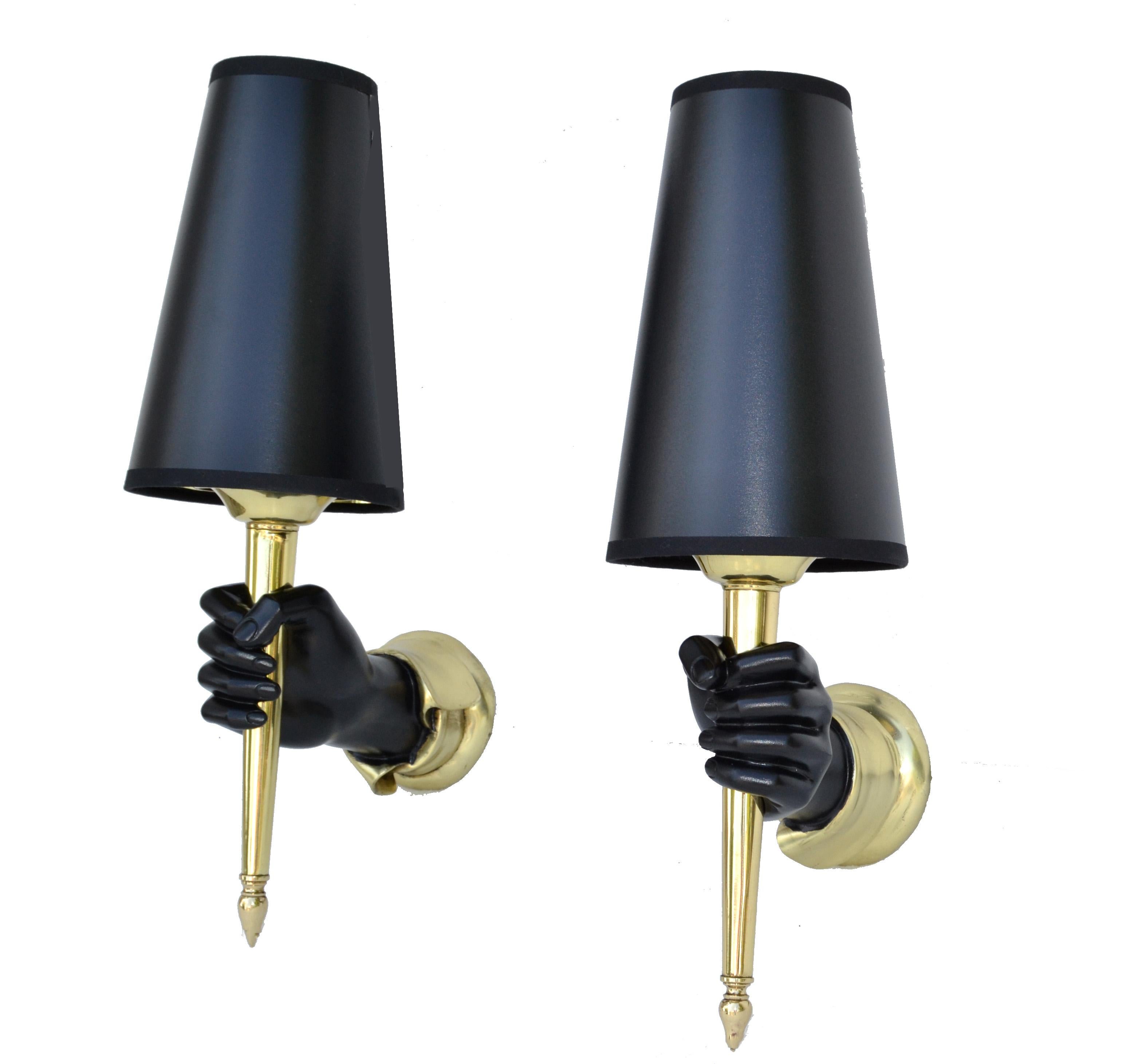 Superb pair of Andre Arbus style sconces in bronze, black finished Hand holding one light, very heavy and well done.
The Pair comes with Custom made Black & Gold Paper Shade.
US rewired and in working condition, each Sconce takes 1 candelabra