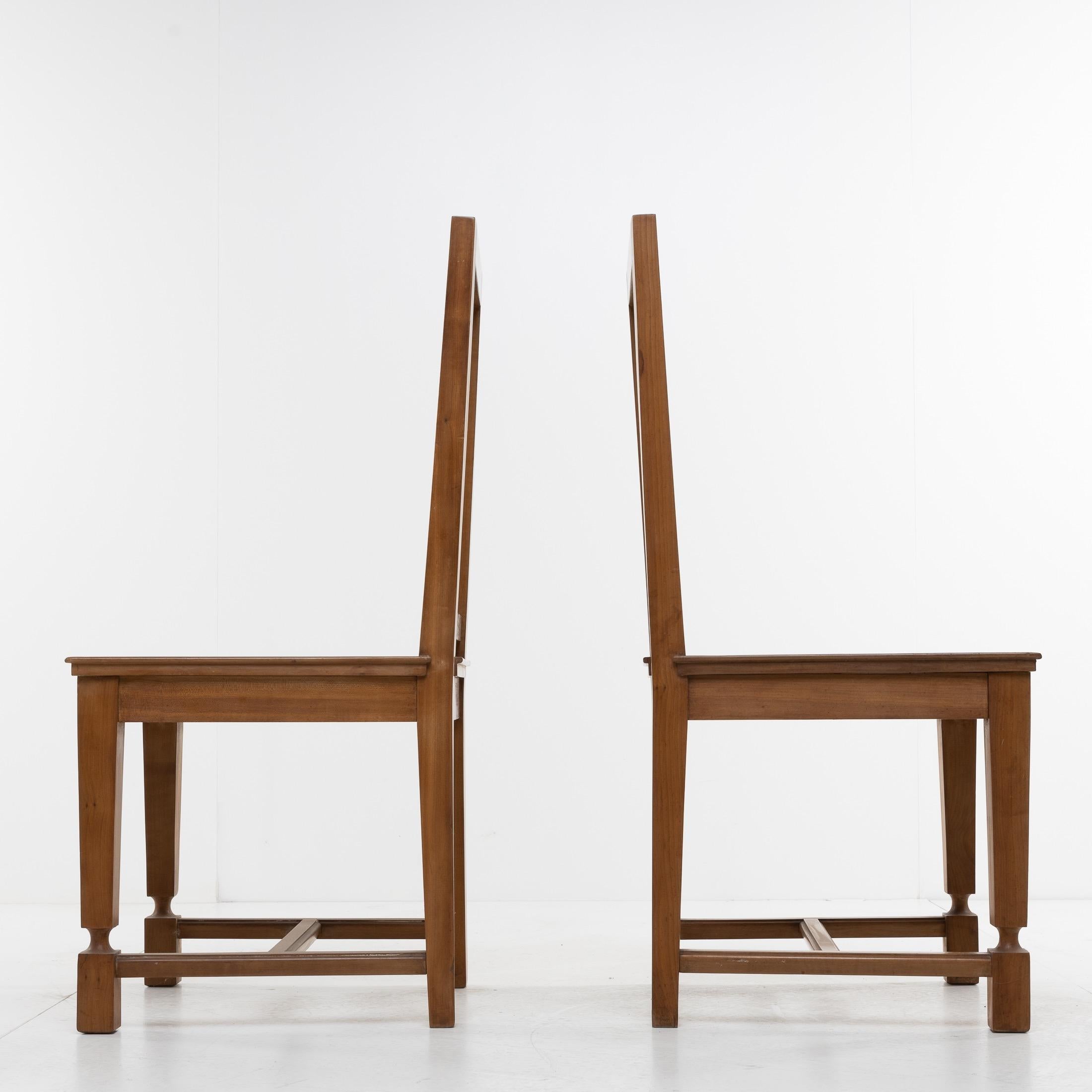 French André Arbus, France, an Elegant Set of 4 Cherrywood Chairs