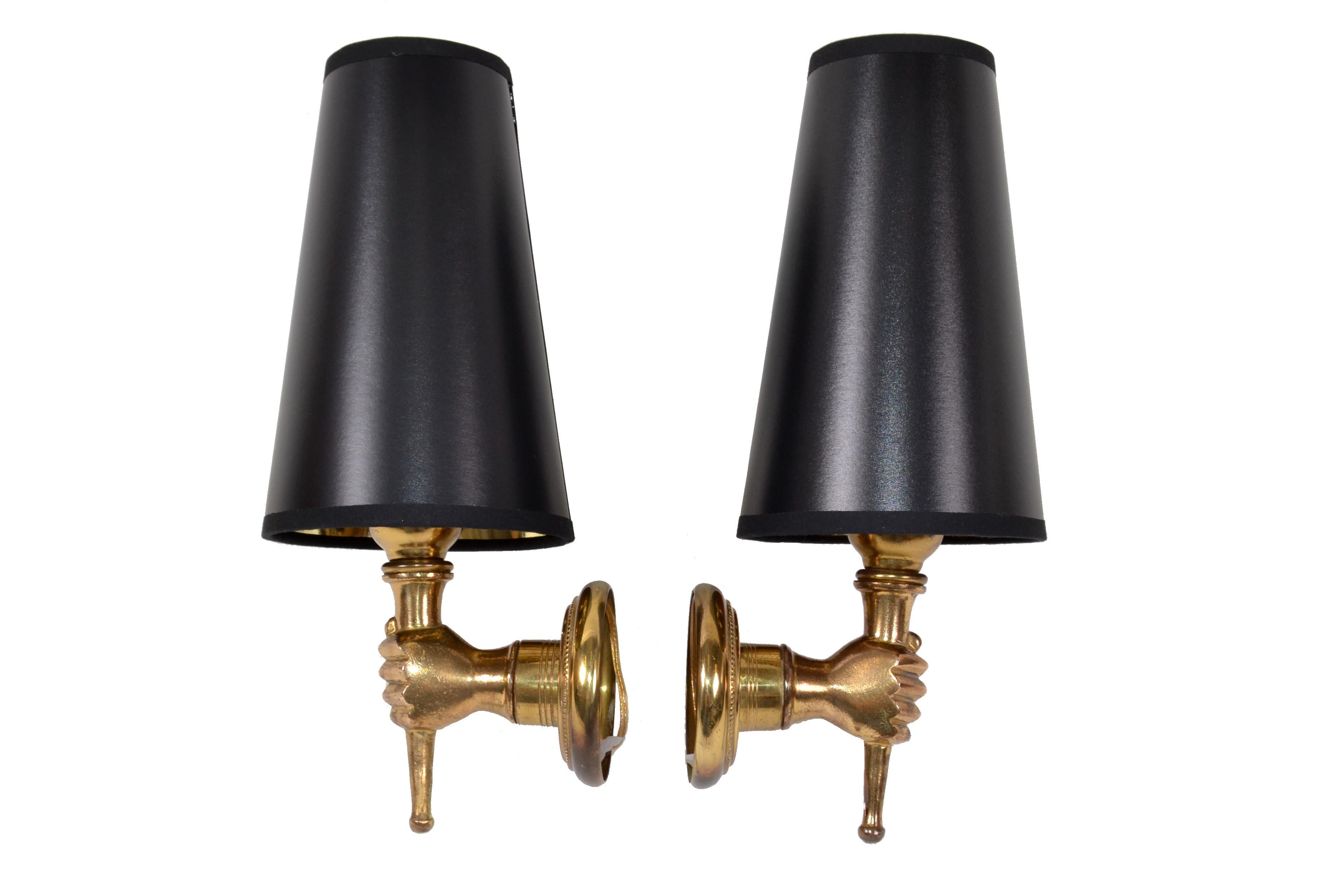 Four pairs available of very elegant André Arbus French bronze neoclassical hand sconces, wall lamps.
Priced by pair.
US rewiring and each takes a light bulb max. 40 watts.
Measures: Back-plate measures: Diameter 3.5 inches.
Height to top of