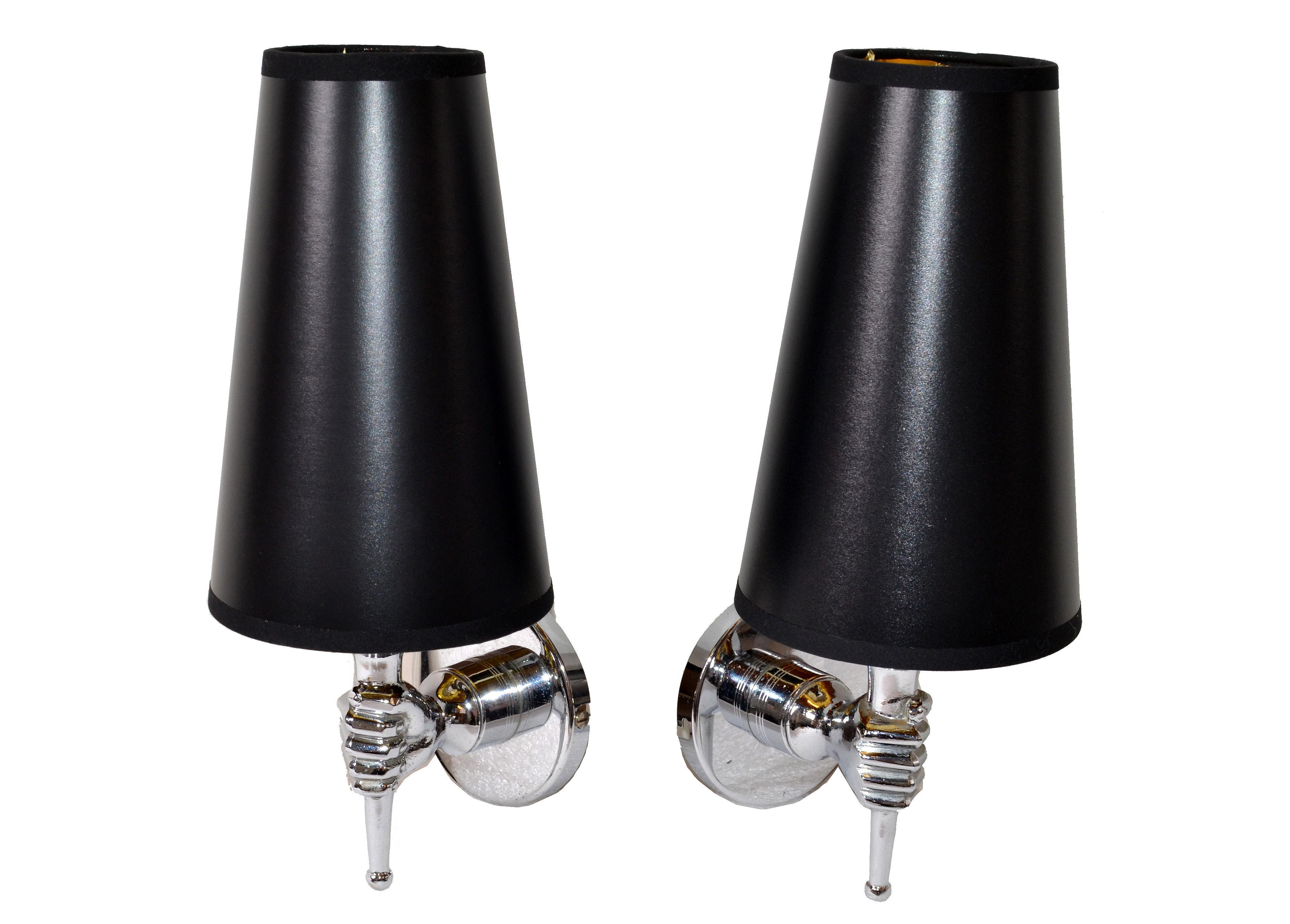 Very nice pair of nickel-plated sconces by Arbus, with black and gold paper shades.
US rewiring and each takes a light bulb max. 40 watts.
Back-plate measures: Diameter 3.5 inches.
Height to top of socket is 5.25 inches.
Sold with shade: Height