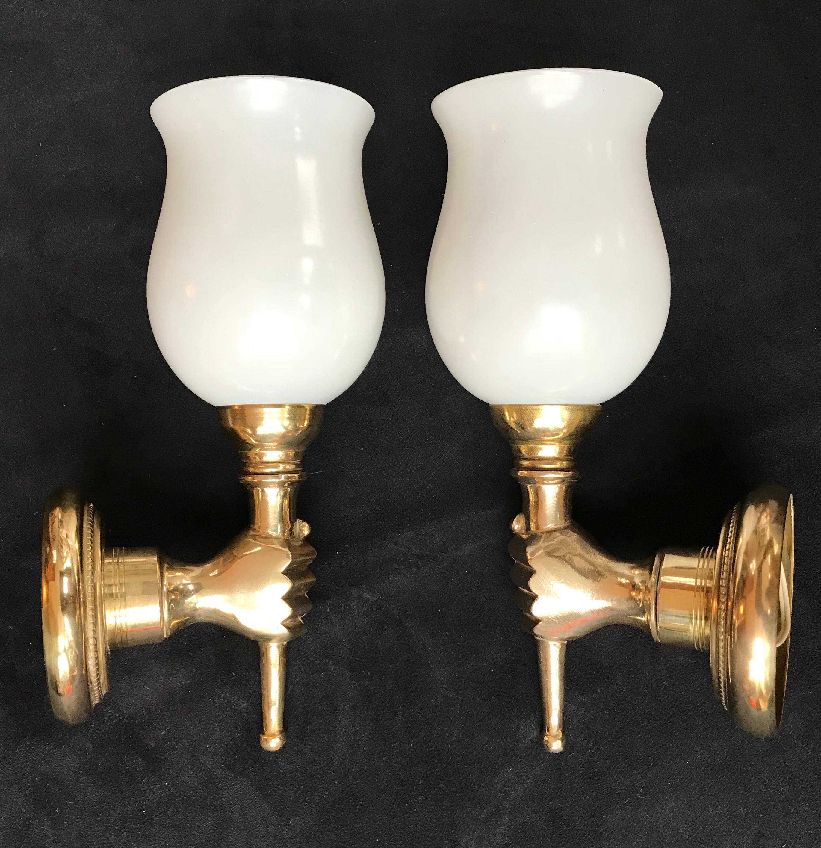 Elegant pair of Andre Arbus Neoclassical wall sconces made in gilt bronze and opaline glasses.
France, 1950s in a very good general condition . Ready to pose on the wall. Sold by pair (2 sconces).
About André Arbus:
Arbus was born in Toulouse in