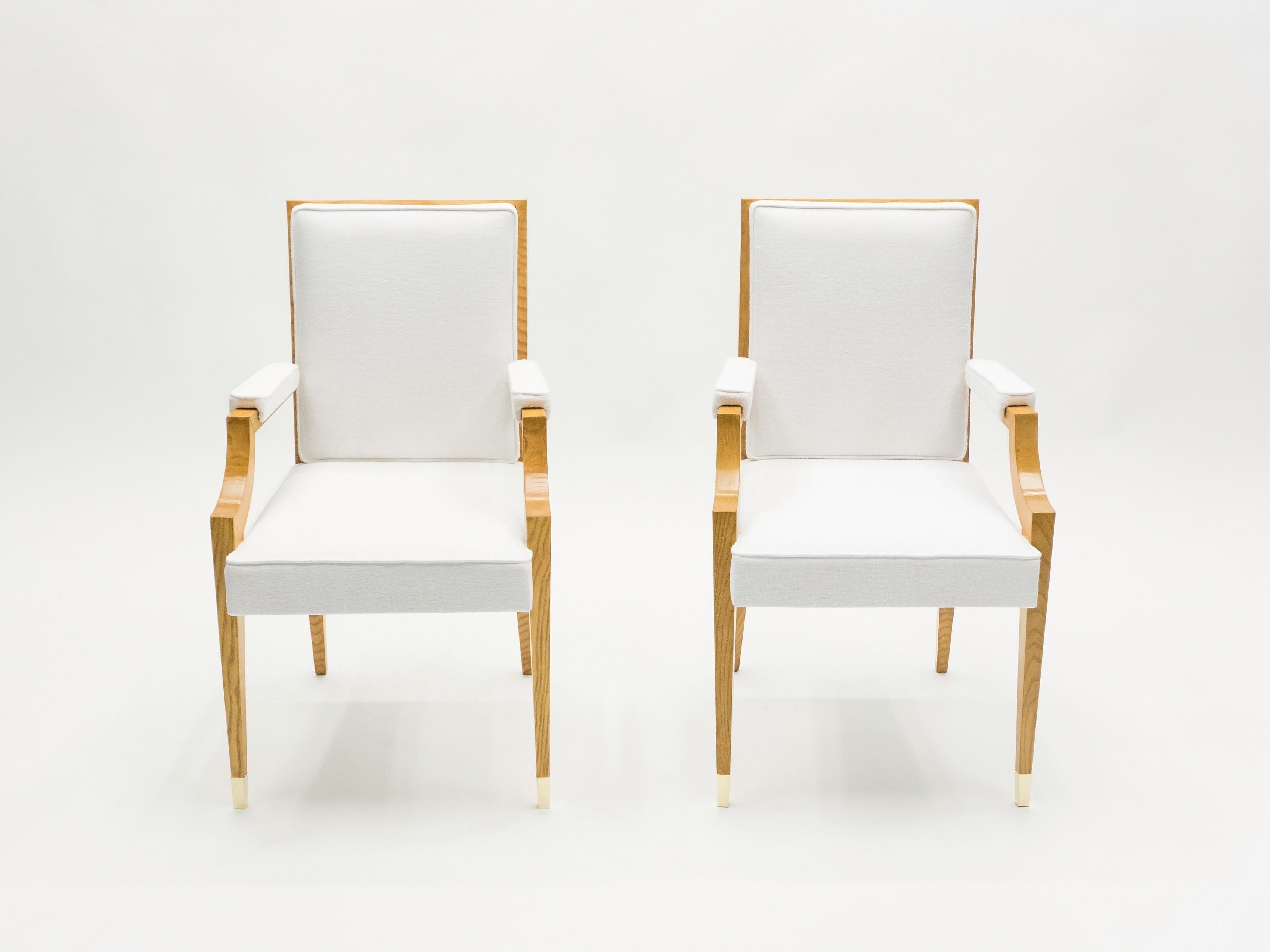 These elegant André Arbus armchairs are sure to add an element of French neoclassicism chic to any room in your home. They were designed and produced by André Arbus for the headquarters of the Compagnie Générale Transatlantique in the late 1940s.