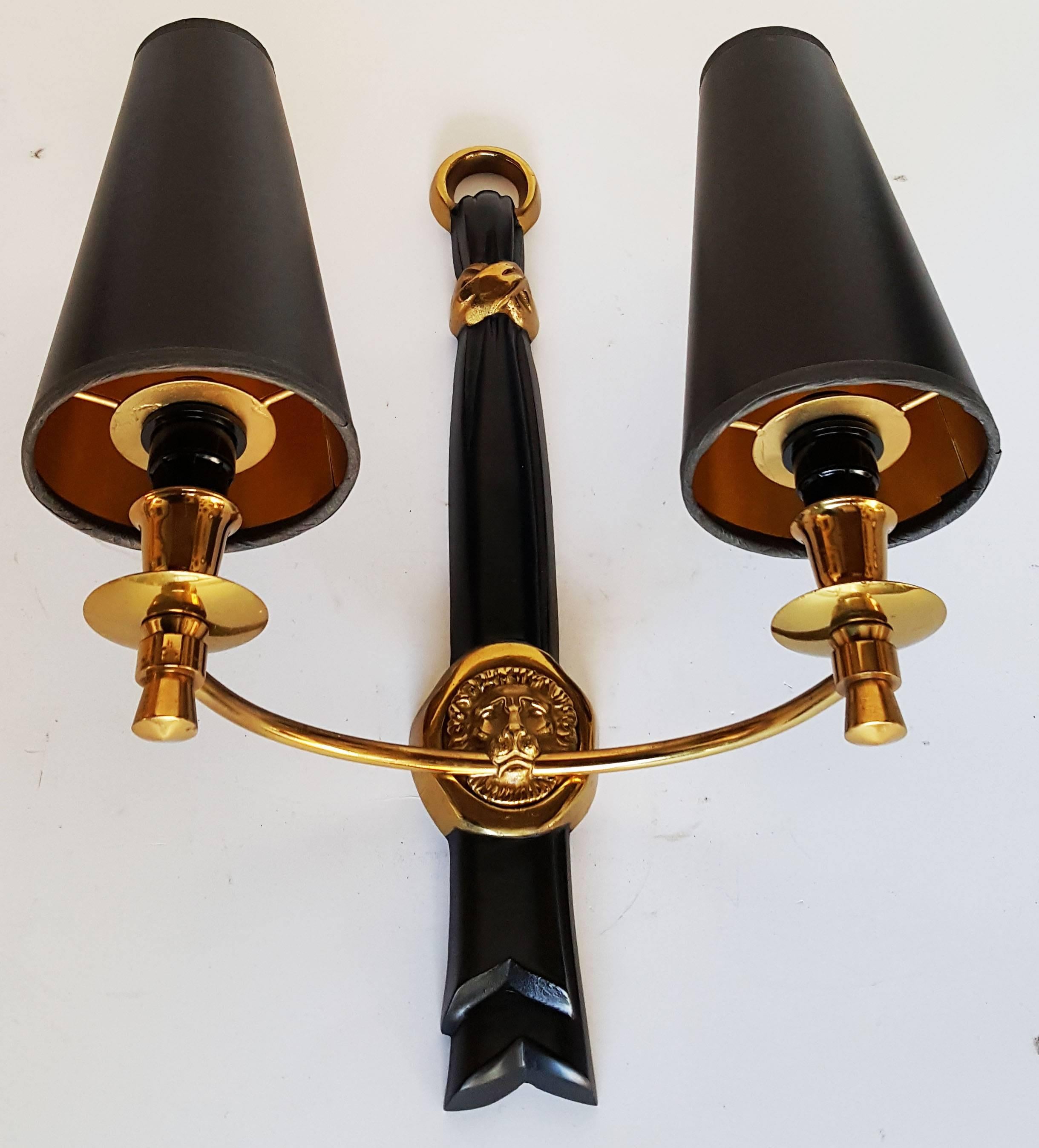 Superb pair of bronze sconces, wall lamps by Andre Arbus.
Two patina, black and brass.
US rewired and in working condition.
Two-light per sconce, 40 watts max per bulb.
2 pairs available priced by pair.