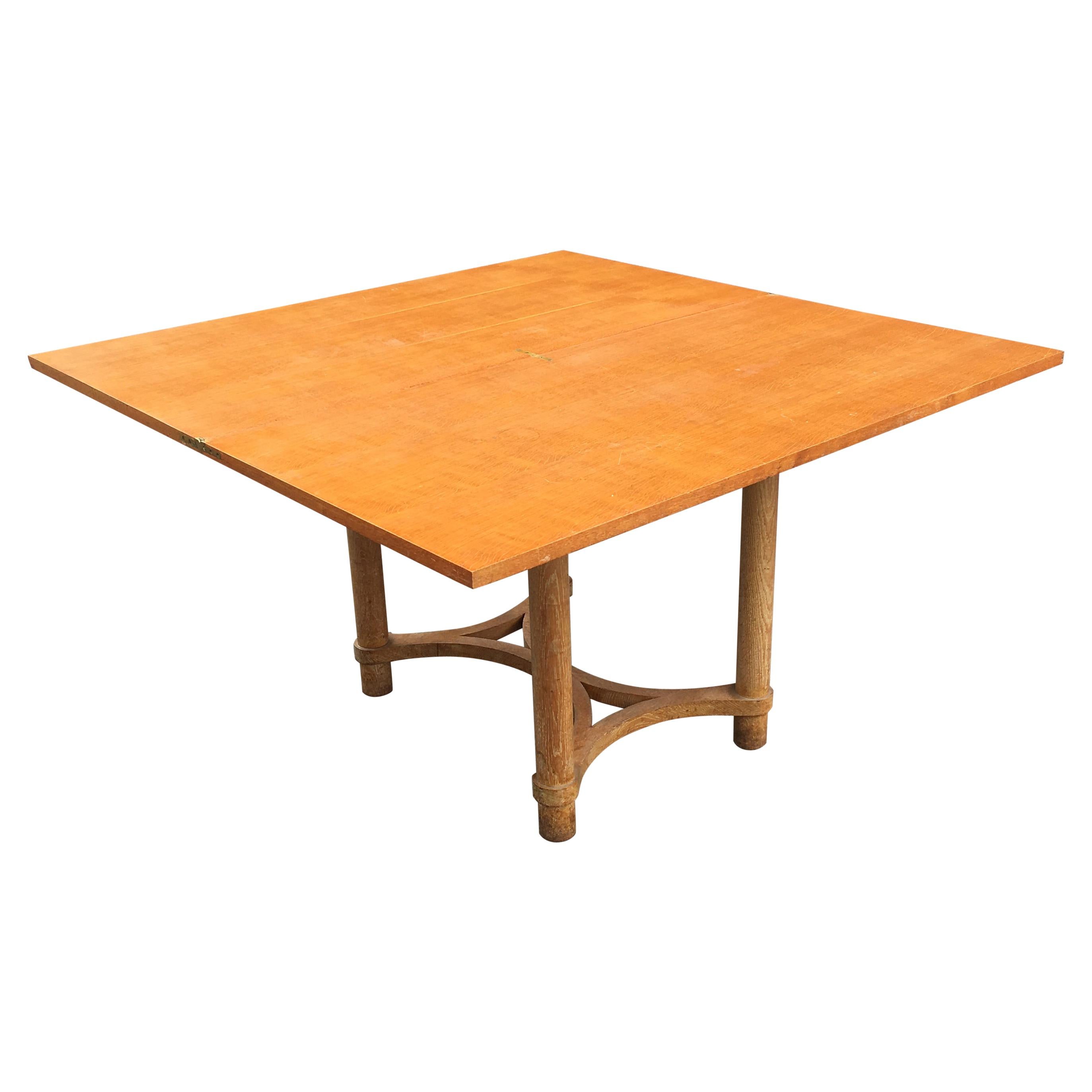 André Arbus, Table tournante rectangulaire en chêne cérusé, circa 1950