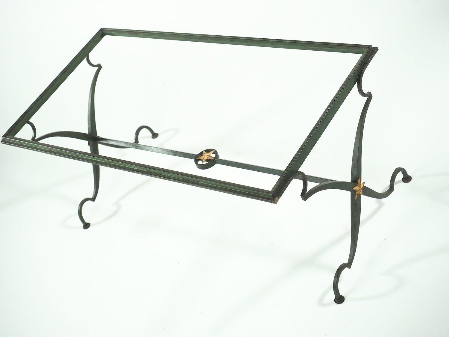 French Forties coffee table in the style of Andre Arbus. Forged iron with bronze verdigris patina and gilt details. Takes glass top.