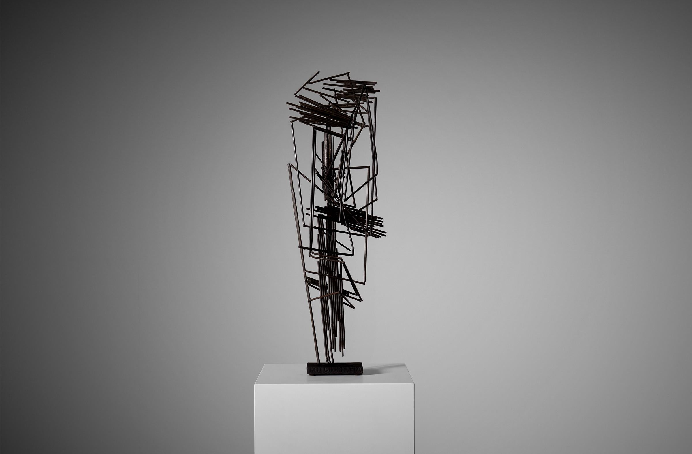 Abstract sculpture by André Bloc (1896 - 1966), France ca. 1960. The sculpture in made from brazed bronze and metal rods on a raw cut metal base, facinating from every angle. Provenance: Villa Bloc, Meudon France. Original certificate of