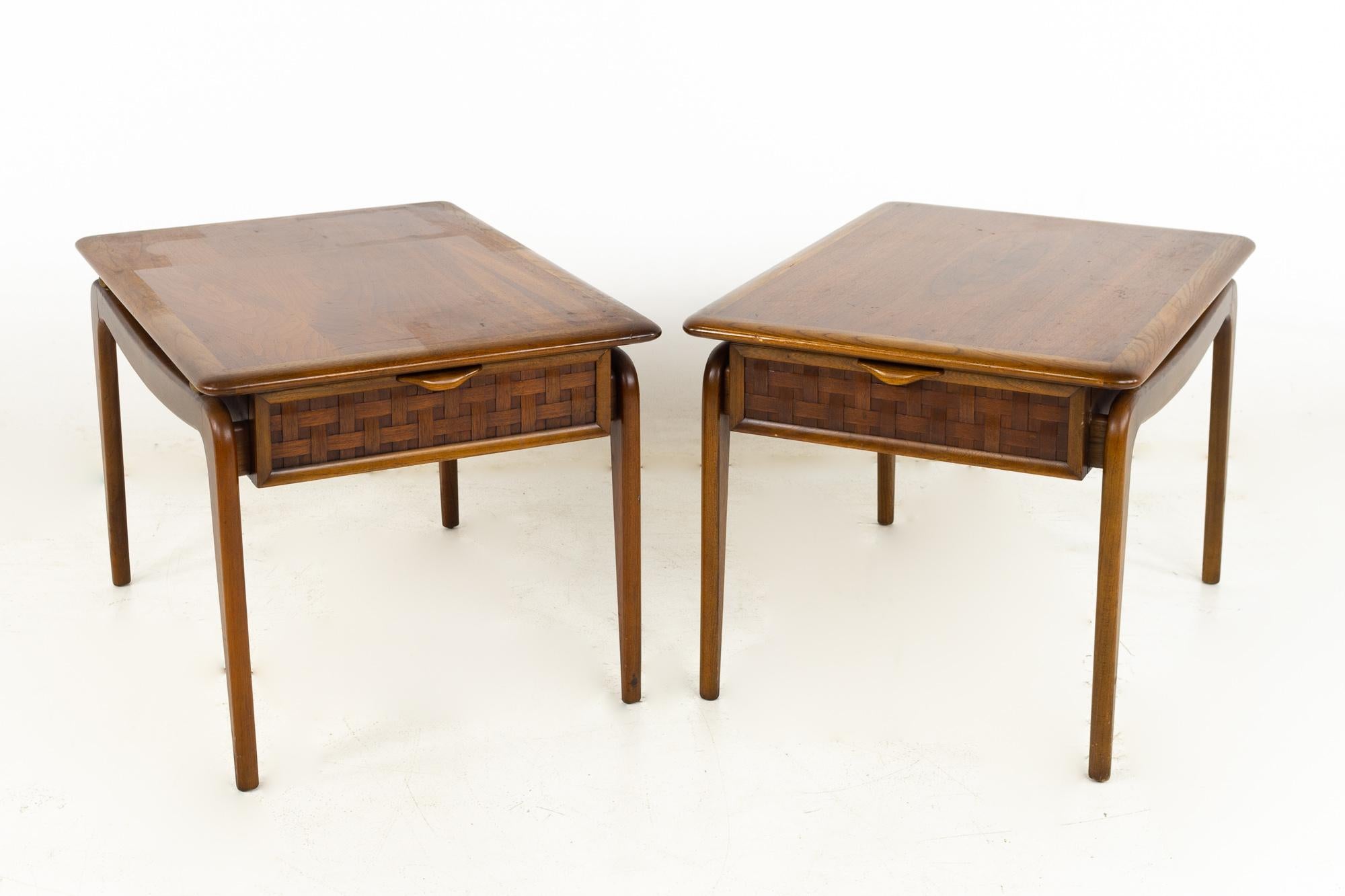 Andre Bus For Lane Perception mid century walnut side end tables- a pair

These tables measure: 22 wide x 30 deep x 19.5 inches high

?All pieces of furniture can be had in what we call restored vintage condition. That means the piece is