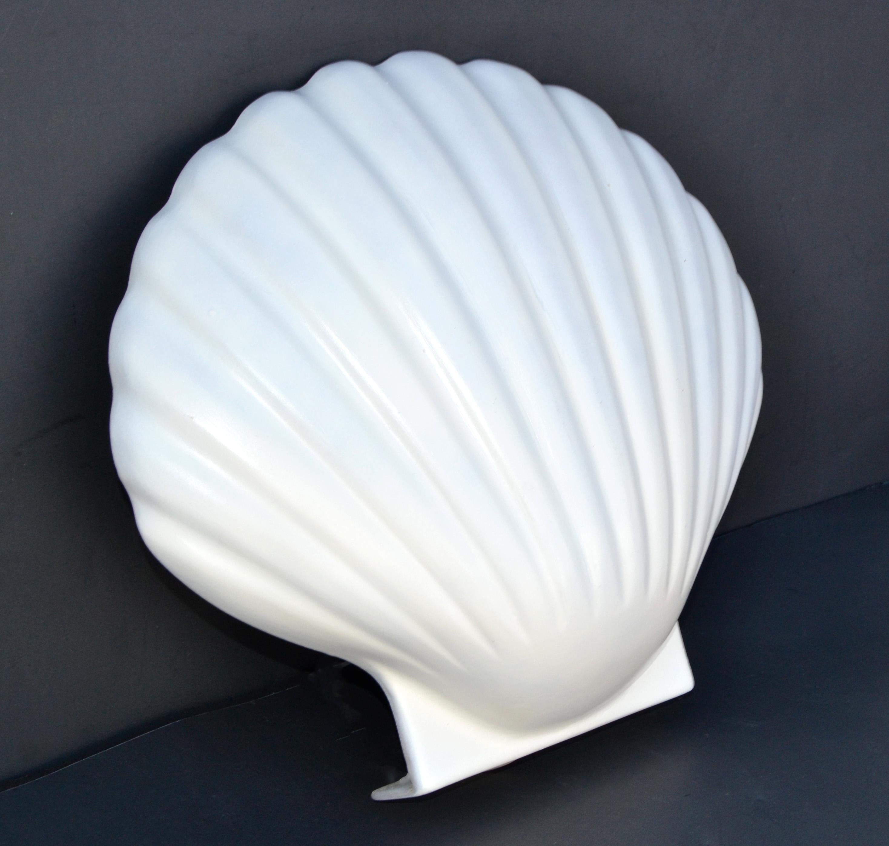 Nice Fiberglass 'St Jacques' sconce, wall lamp by Andre Cazenave. 
Mid-Century Modern design made in 1975.
The Scallop Shell takes one light, 40 watts max. US rewired and in working condition.
Have a look on our impressive collection of more than