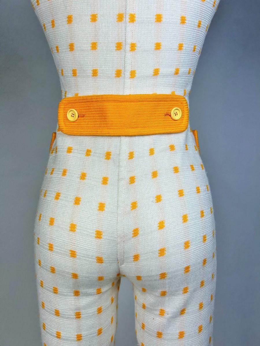 André Courrèges Hyperbole white and yellow wool knit jumpsuit France Circa 1970 For Sale 6