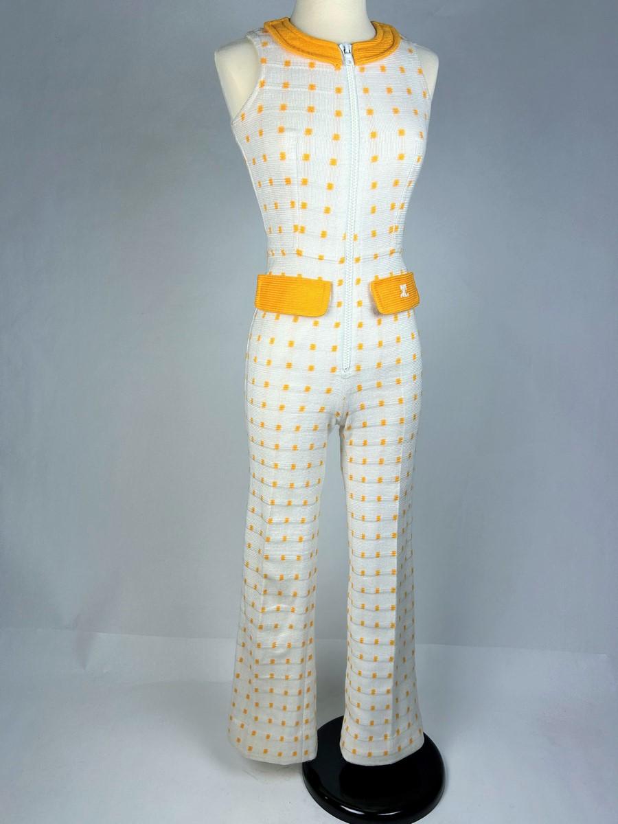 André Courrèges Hyperbole white and yellow wool knit jumpsuit France Circa 1970 For Sale 1