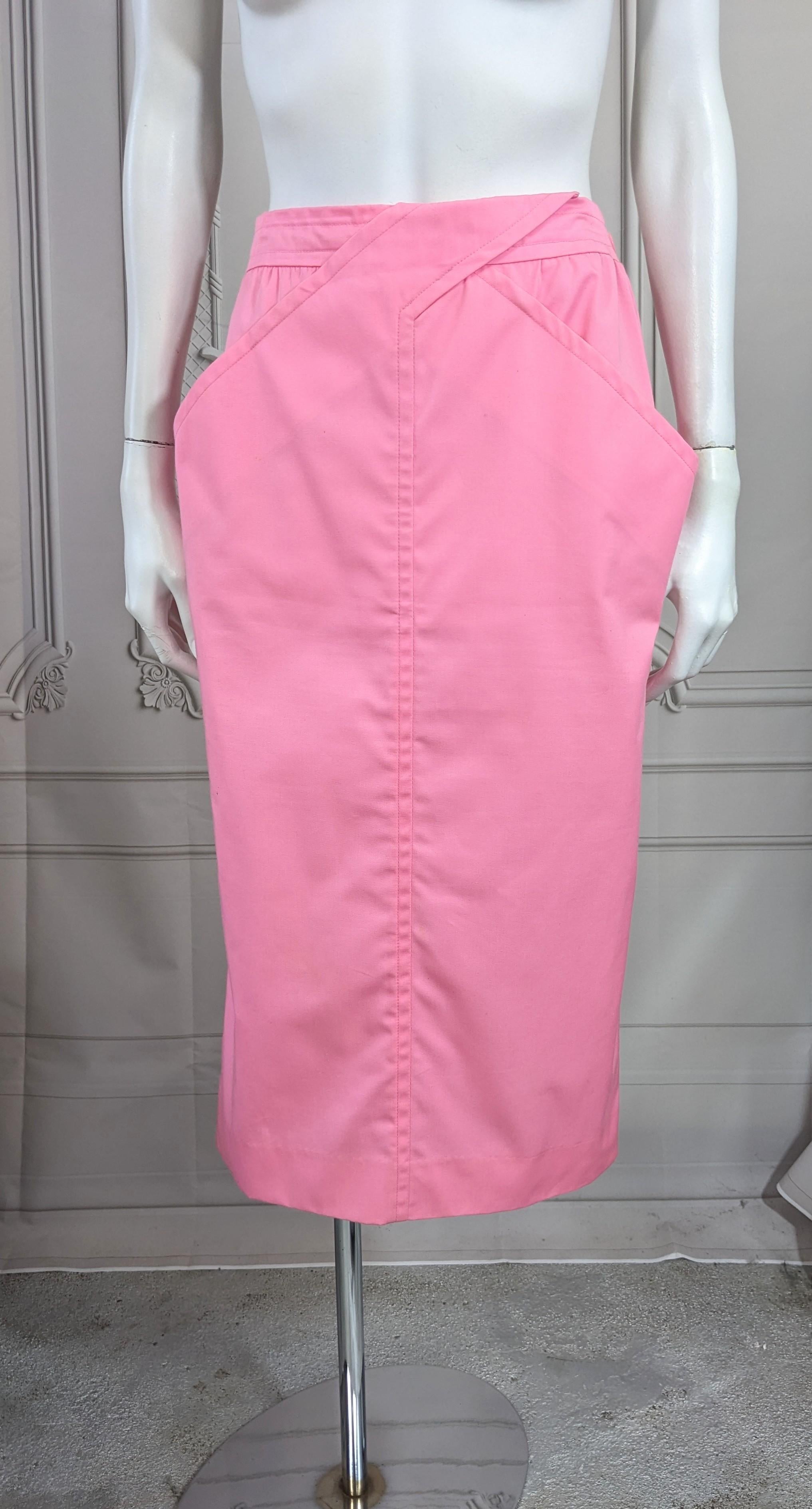 Cool Andre Courreges Pink Crossover Skirt from the 1980's. Unusual design with side pockets which stand away from slim cut skirt, back vent and side zip, 1980's France. Courreges size A, approx M-L.