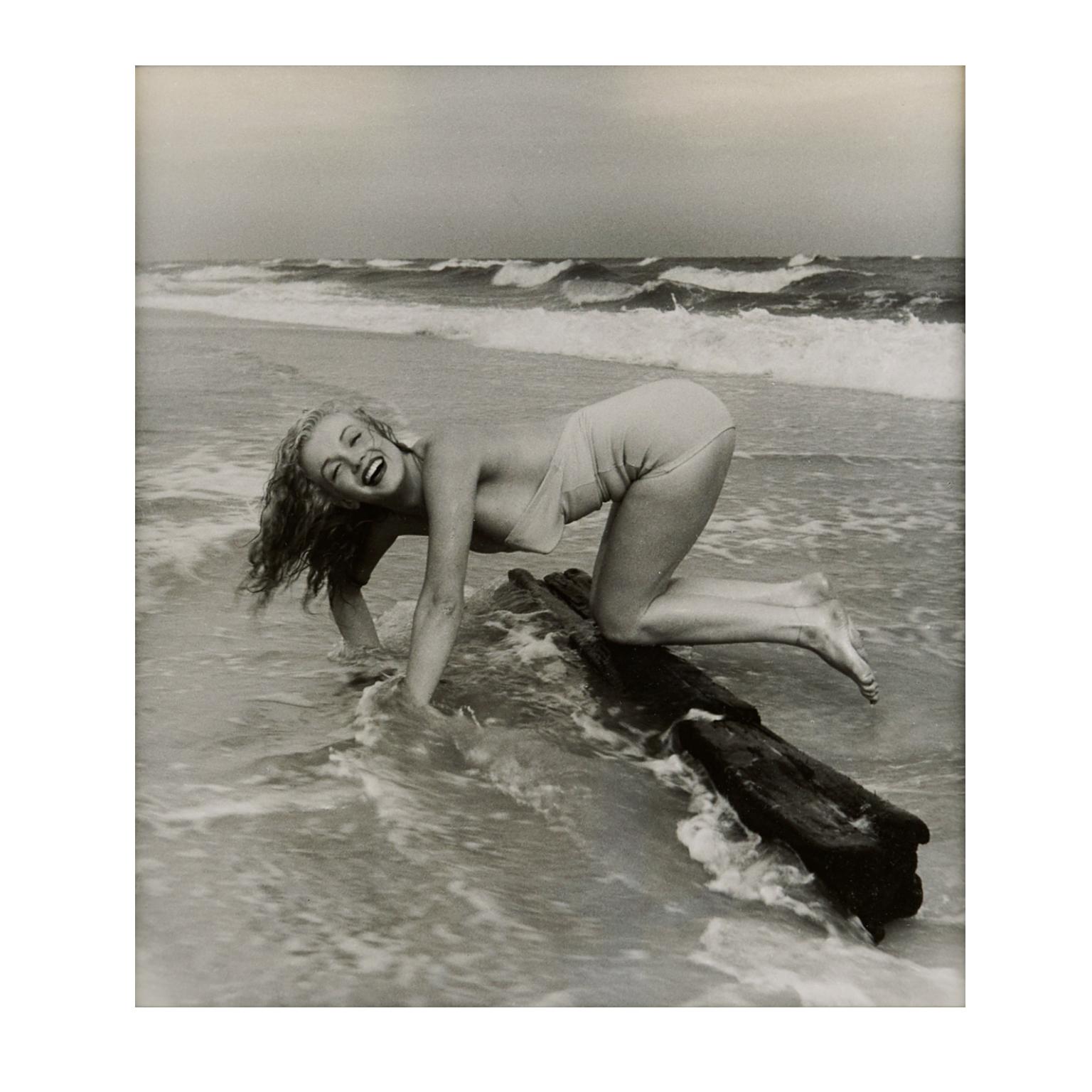 Andre de Dienes Portrait Print - Marilyn Monroe by André de Dienes,  'Playful on the Beach', Black and White