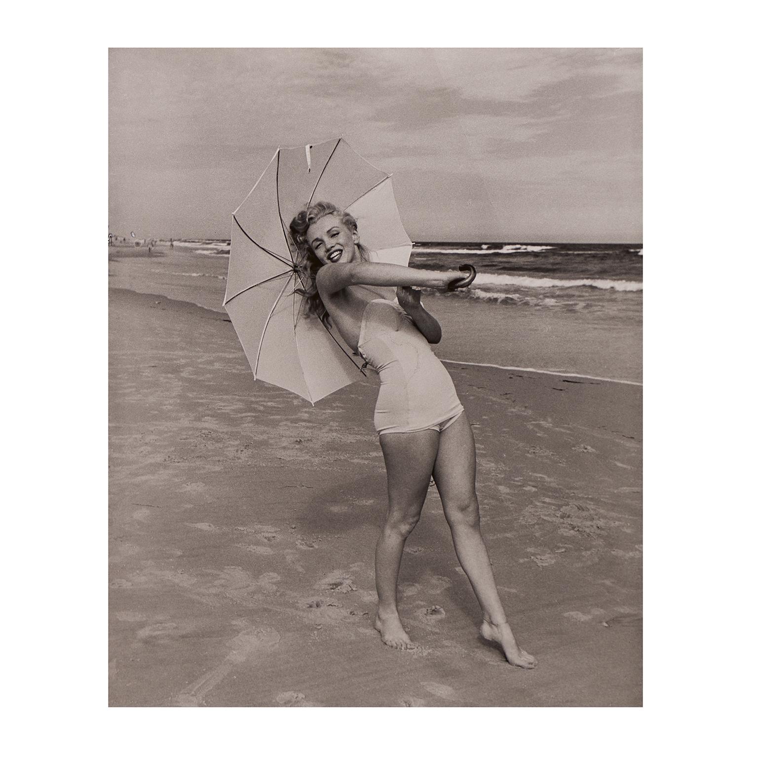 Andre de Dienes Portrait Print – Marilyn Monroe 'Umbrella Girl on Beach' by André de Dienes - Black and White