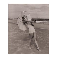 Marilyn Monroe 'Umbrella Girl on Beach' by André de Dienes - Black and White