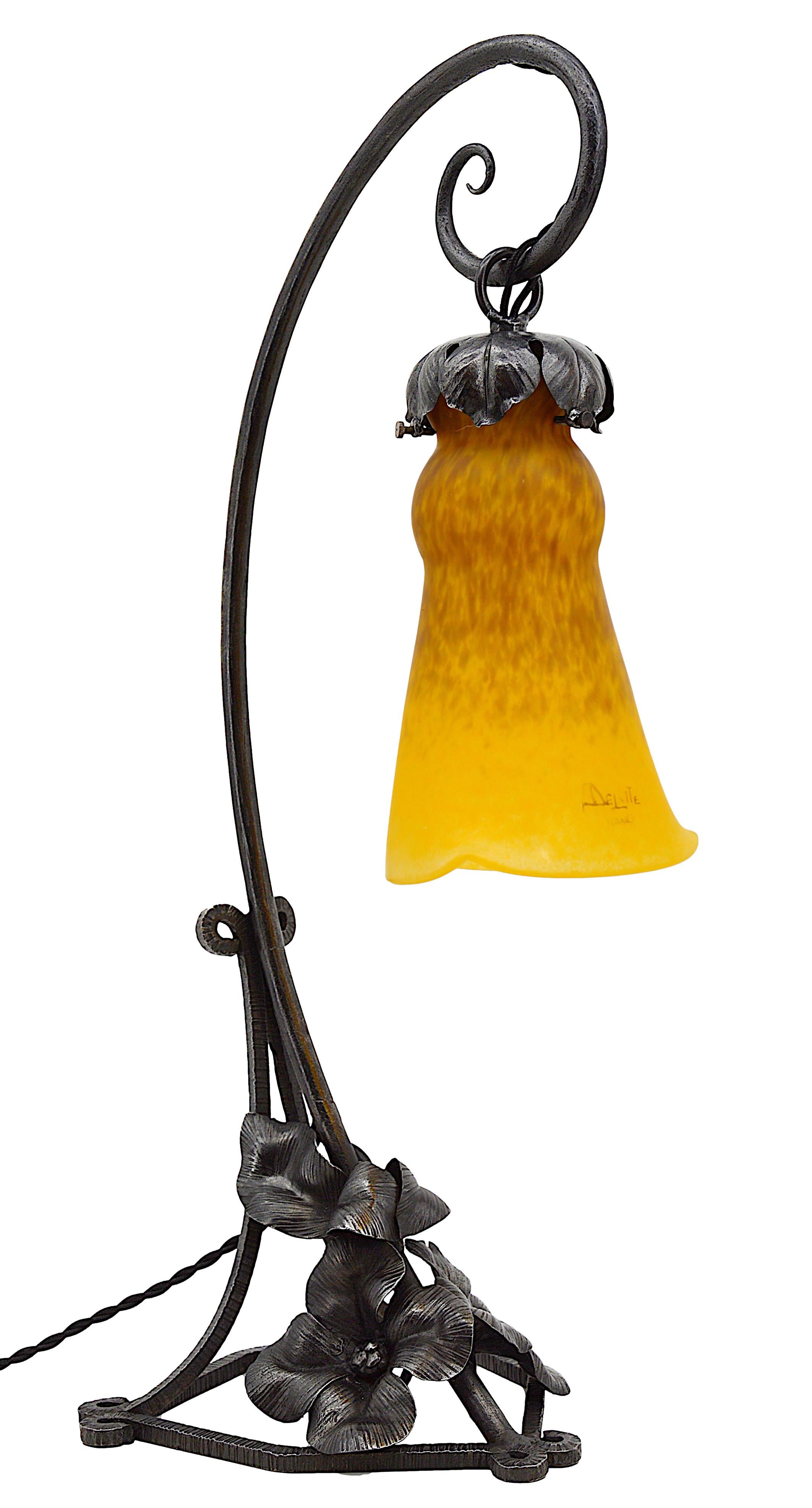 Large French Art Deco Table Lamp by André Delatte (Jarville, Nancy), France, 1920s. This stunning lamp features a blown double glass shade created by Delatte, elegantly suspended from its wrought-iron base. The lamp exudes the refined artistry of
