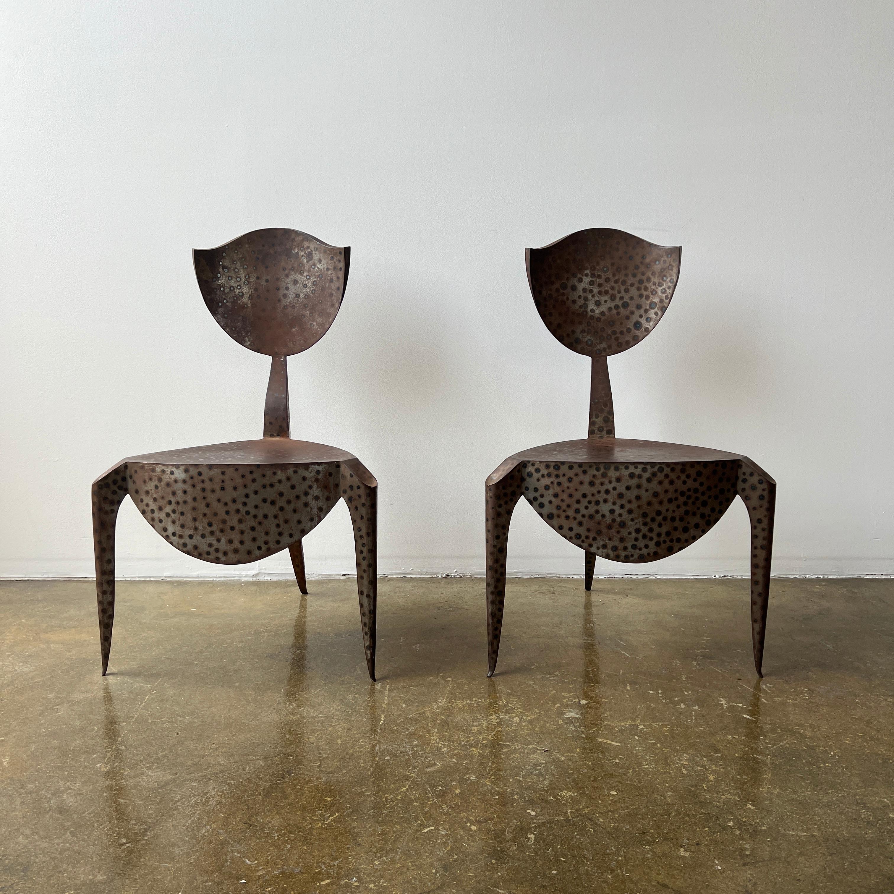 Rare pair of Andre Dubreuil Paris chairs. Heavy patina to the metal.