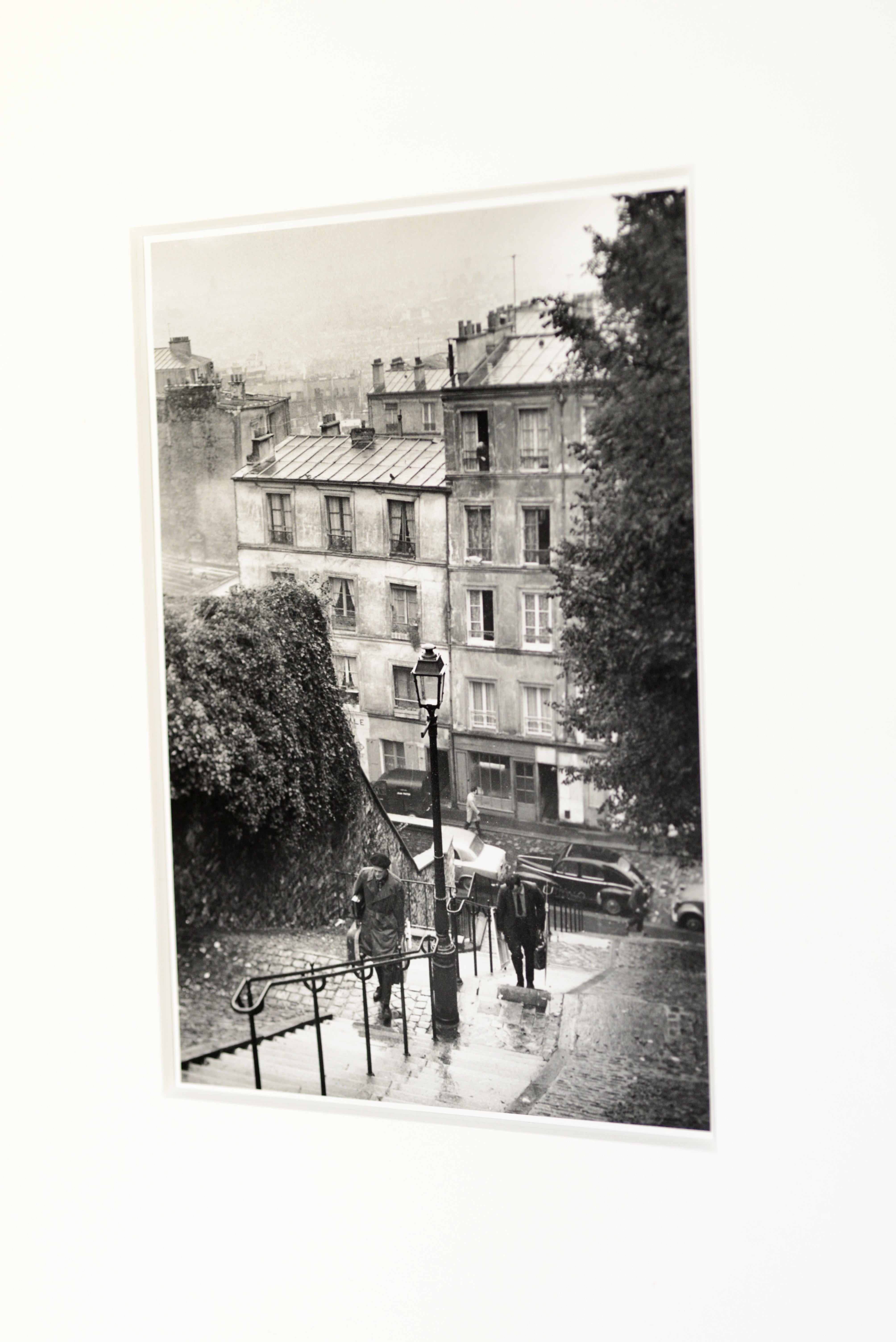 Andre Kertesz (Hungarian/American 1894-1985)
Title: 'Montmarte', Paris, 1963

Gelatin silver print
Signed in ink 
titled, dated '10-31-63' in artists hand in ink au verso
'Corkin Gallery' label au verso
Image size: 8