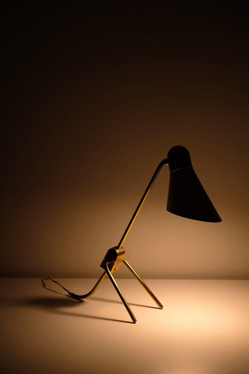 Iconic desk lamp by André Mounique/ Charlotte Perriand for Jumo, made in France. Polished solid brass body, lacquered aluminium shade, solid brass fittings, 40 watts max E-14 European bulb recommended or higher if LED/CFL.