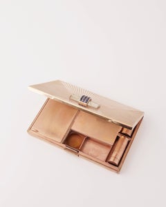 Andre Schwob, Minaudiere retro de metal dorado y zafiros, Modelo Boucheron, 1935