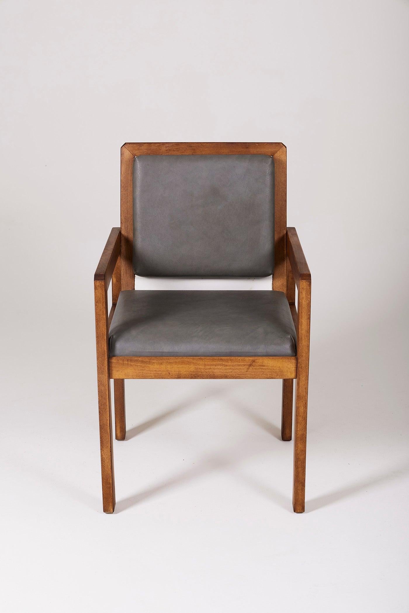 Armchair by French designer André Sornay, 1950s. Wooden frame, gray leather seat and back. Very good condition. 2 availables. Lp1150-1151.