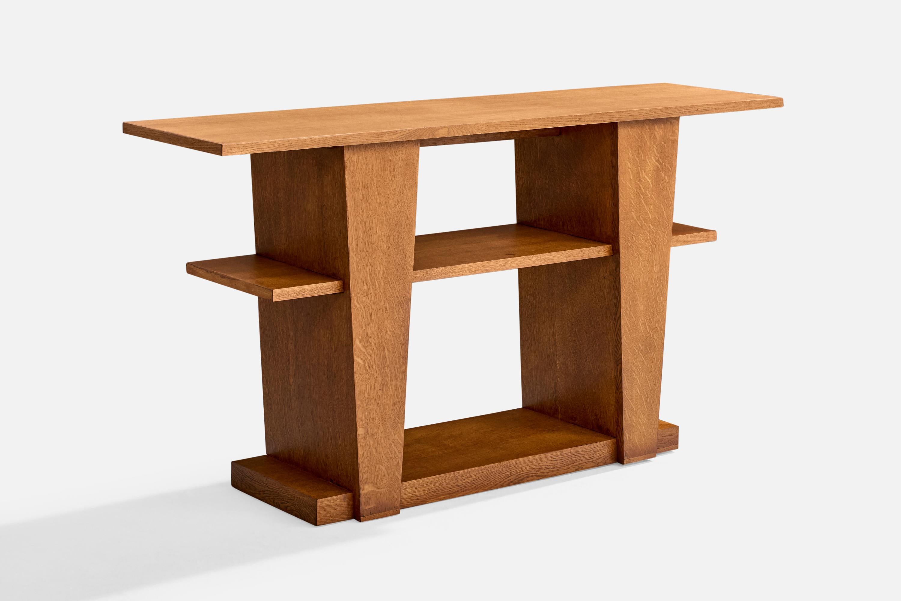 A wood console table attributed to André Sornay, France, c. 1930s.

Overall Dimensions (inches): 33.25