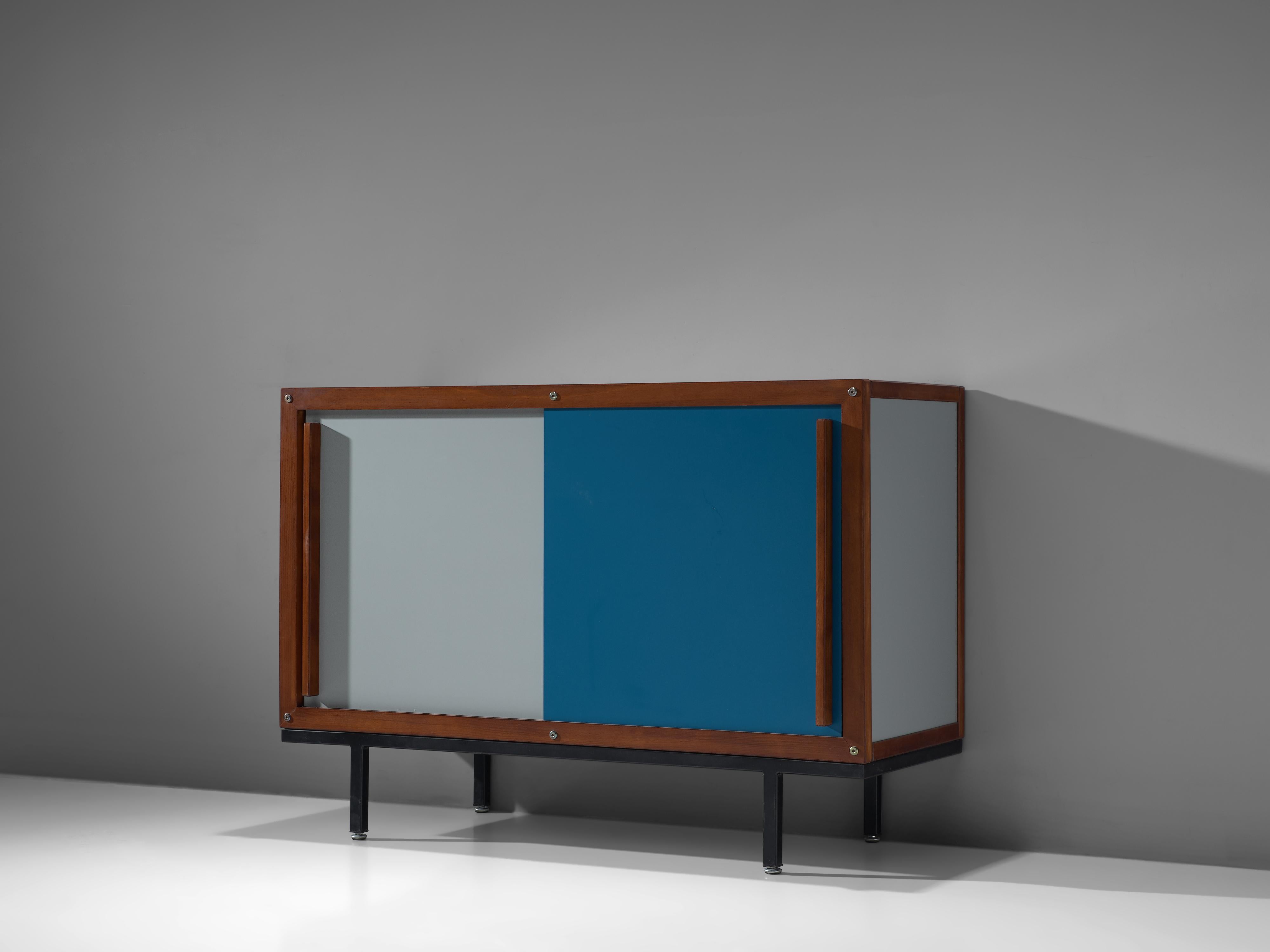 Andre Sornay, sideboard, oak, metal, France, 1960s.

This sideboard is designed by the French cabinetmaker Andre Sornay. The sideboard is executed in blue and gray sliding doors that are framed with oak. This cabinet is solid and executed to
