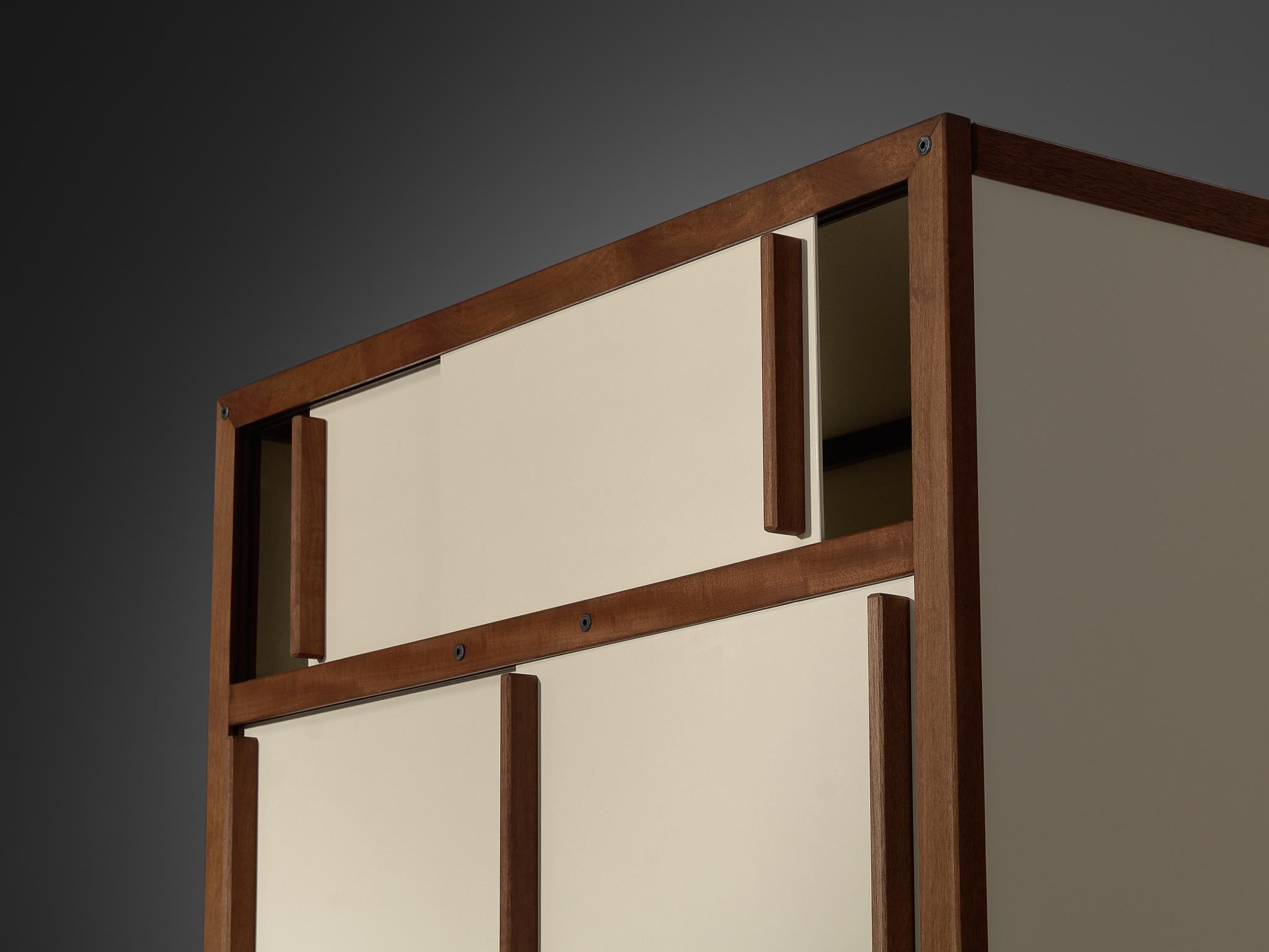 Mid-Century Modern André Sornay Armoire ou penderie à portes coulissantes en acajou en vente