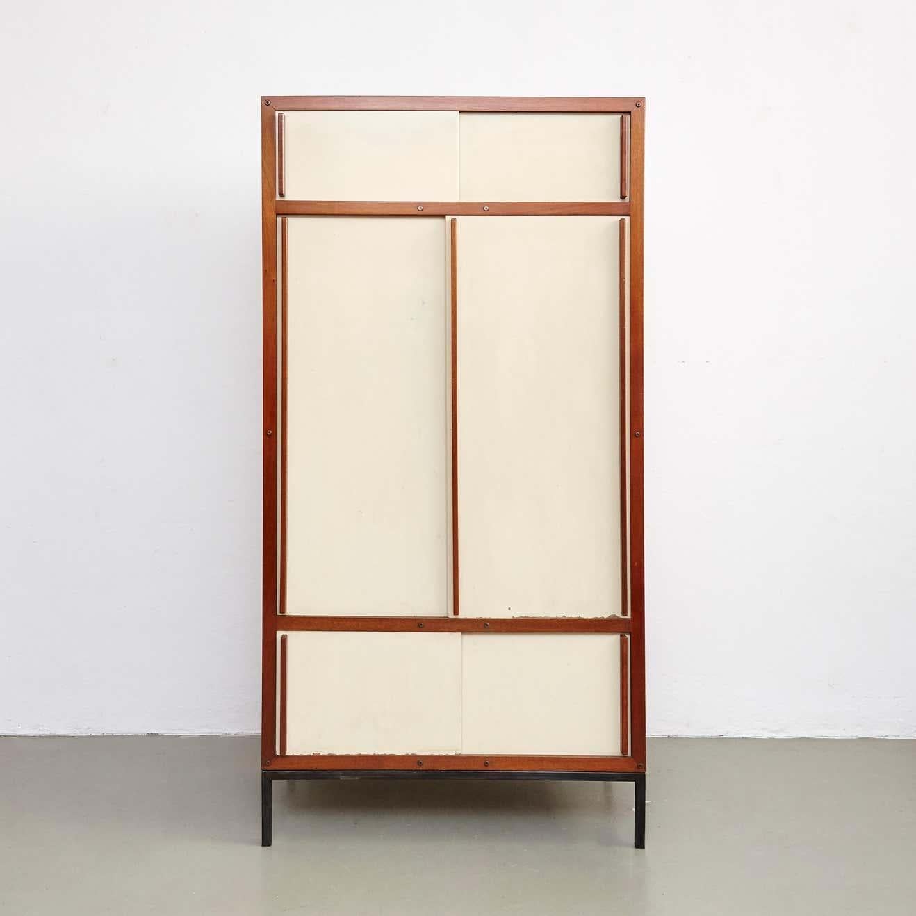 Cabinet designed by André Sornay.
Manufactured in France in 1950s.

In original condition with minor wear consistent with age and use, preserving a beautiful patina.
The metal base structure is redone.

André Sornay (France, 1902-2000) joined