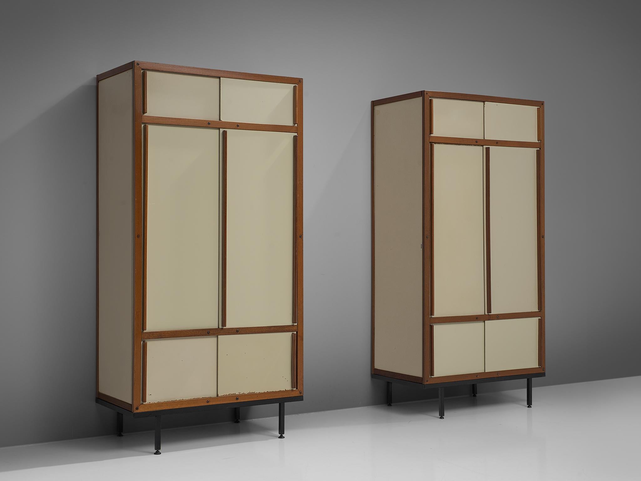 André Sornay for Atelier Sornay, cabinets, honduras mahogany and metal, France, circa 1960.

French midcentury modernist armoires by the Avant Grade creator Andre Sornay. The wooden front panels form a dynamic geometric abstraction in cream